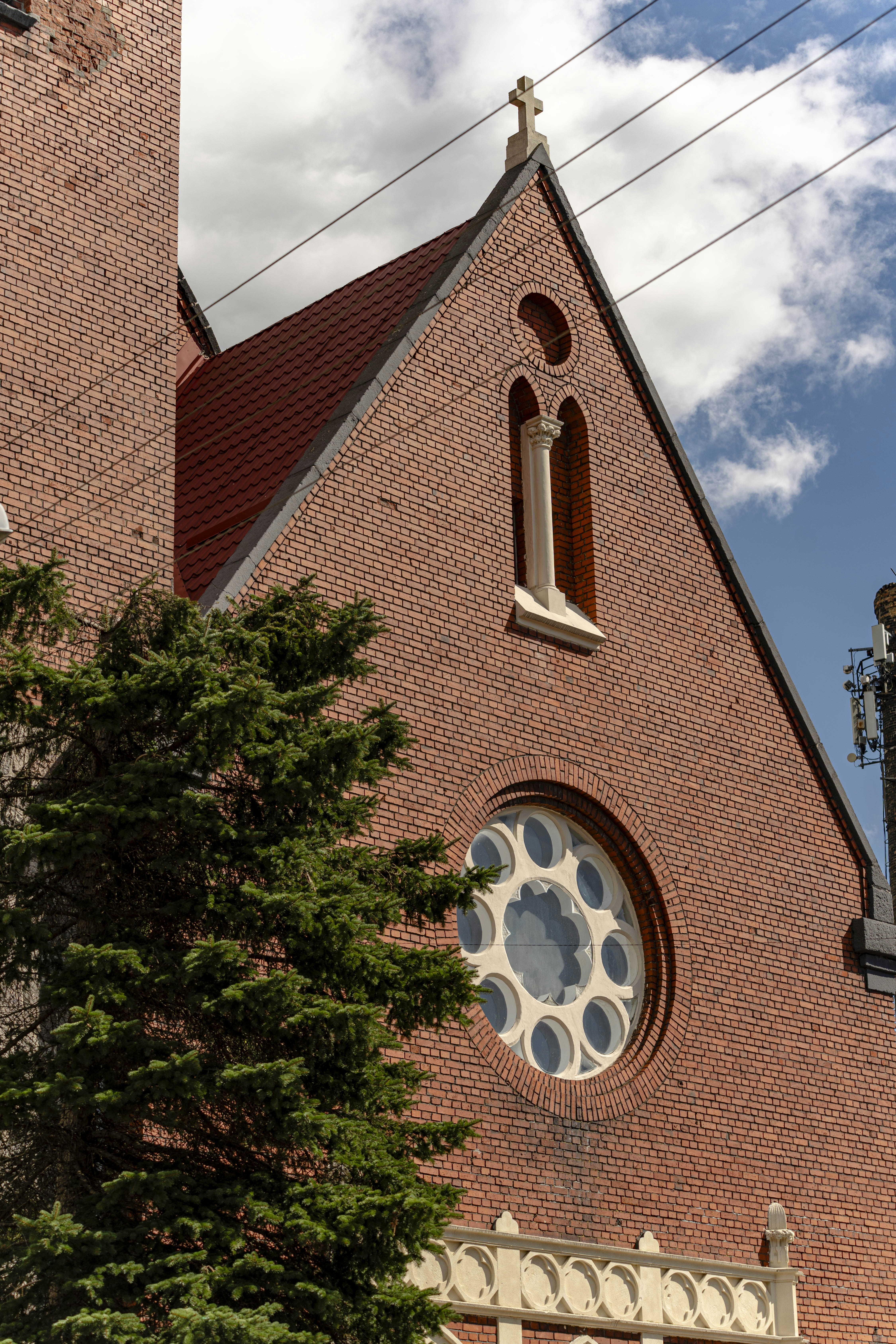 Red brick church with rose window - Free Photo on Unsplash