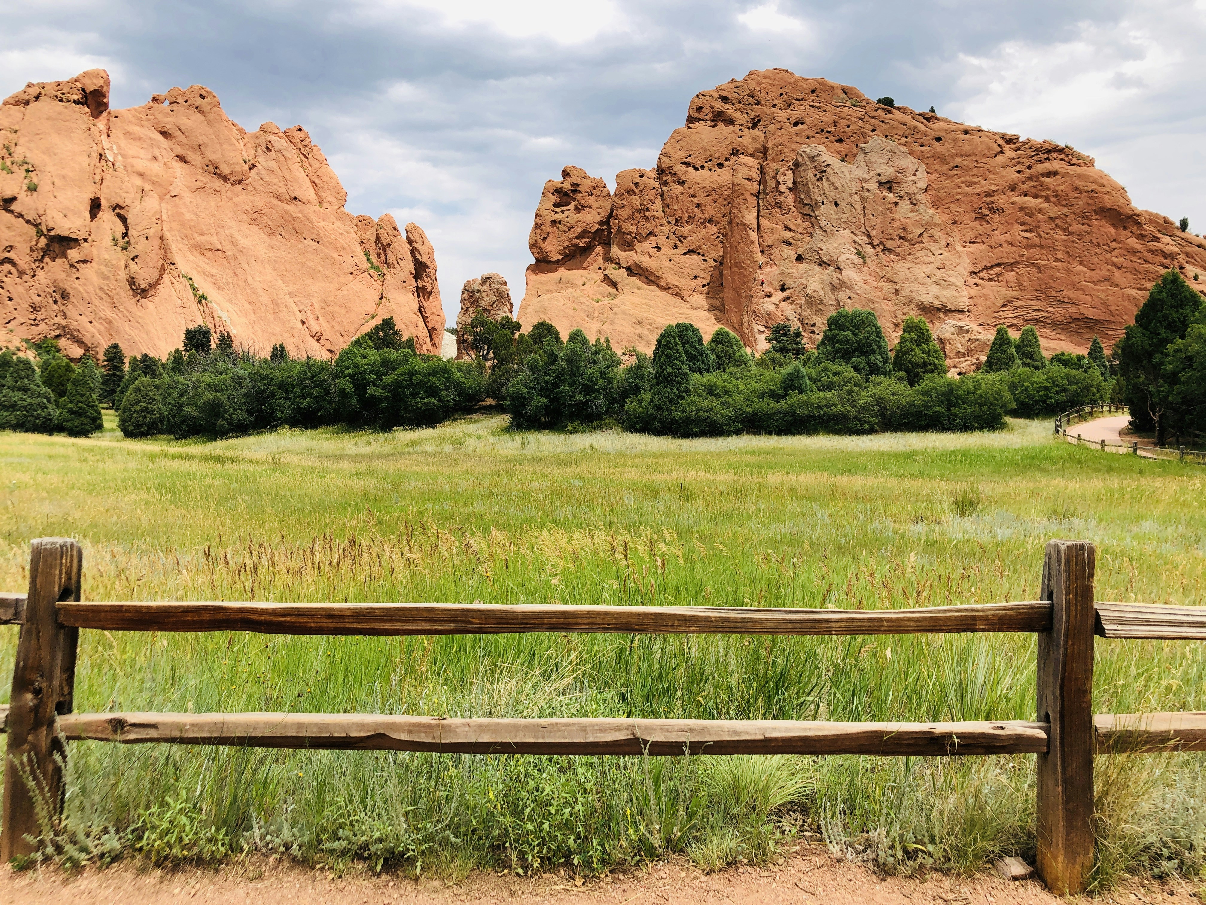 Wooden fence before red rock formations - Free Photo on Unsplash