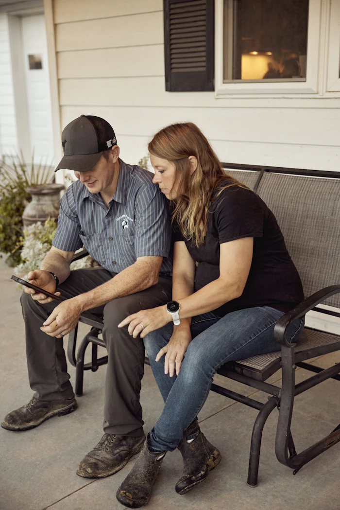 Couple relaxing together on a porch