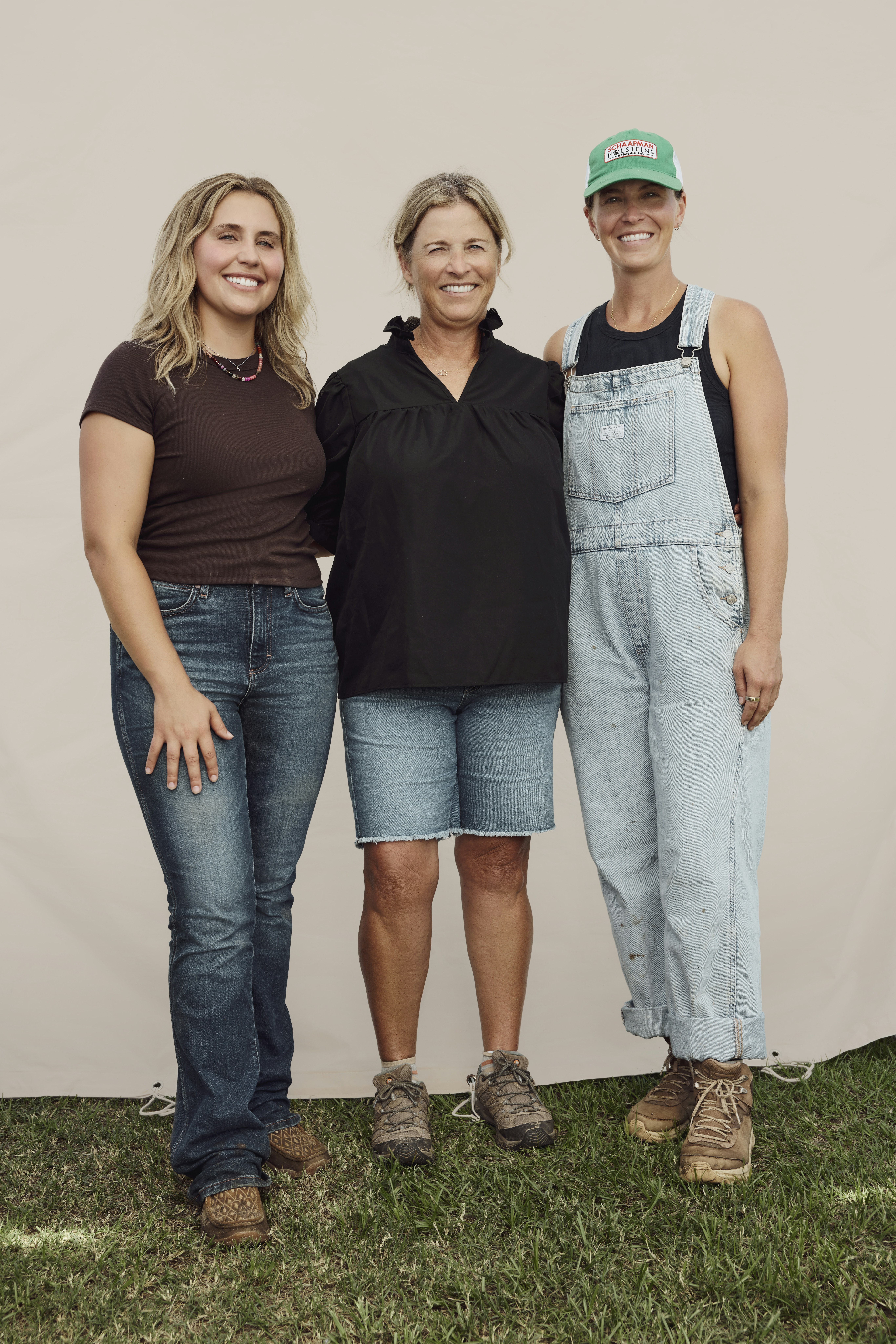 Three women farmers standing together