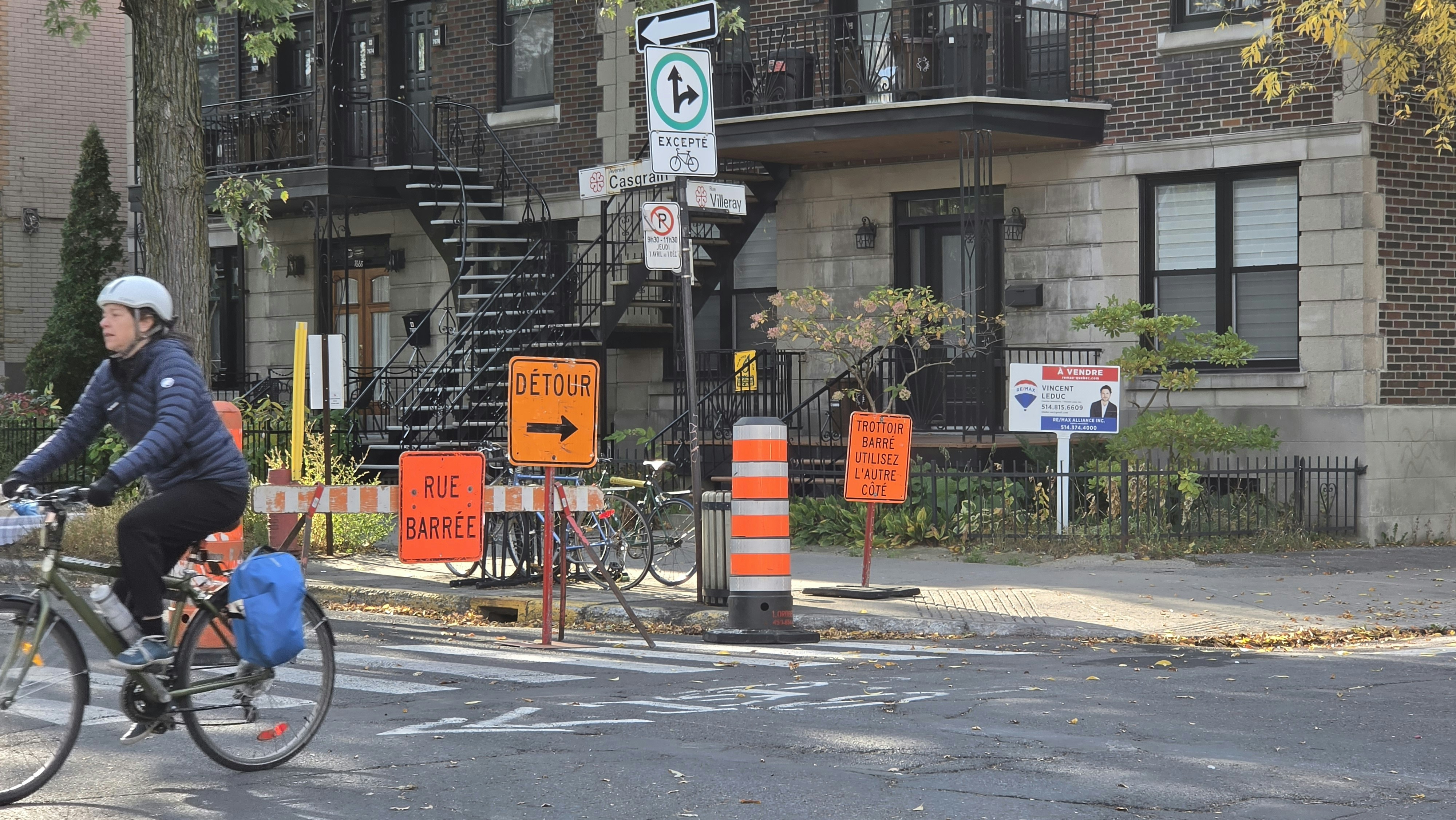 Cyclist passing road construction in Montreal - Free Photo on Unsplash