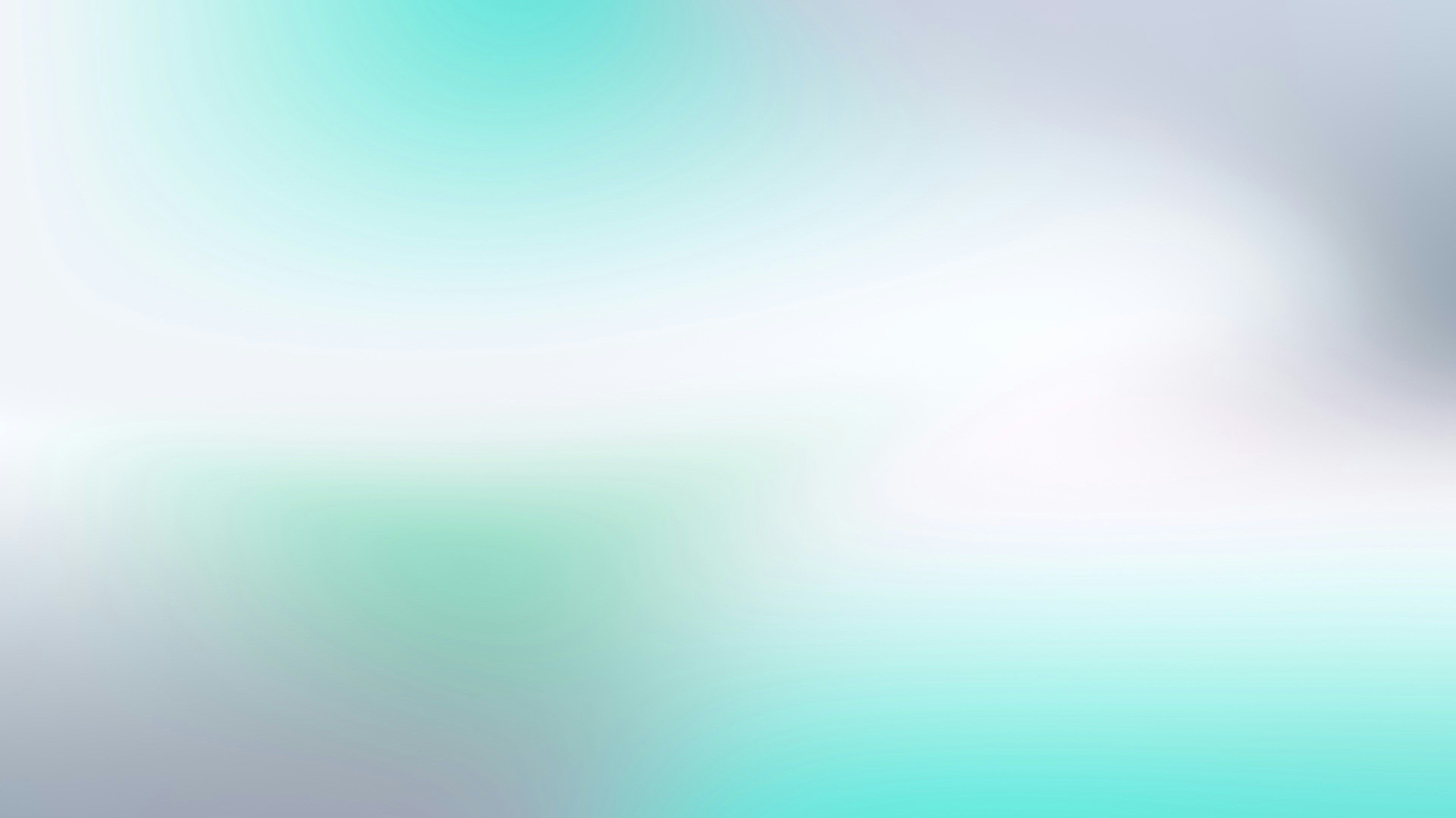 A soft gradient shifting from pale turquoise to light grey