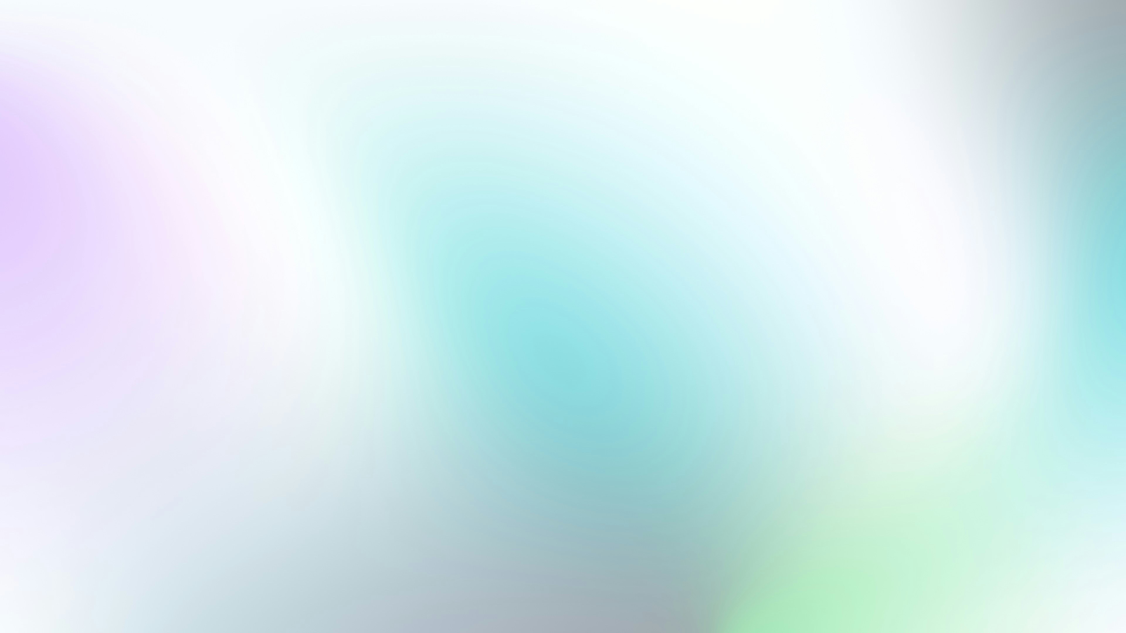 A soft gradient shifting from pale purple to bright cyan and white