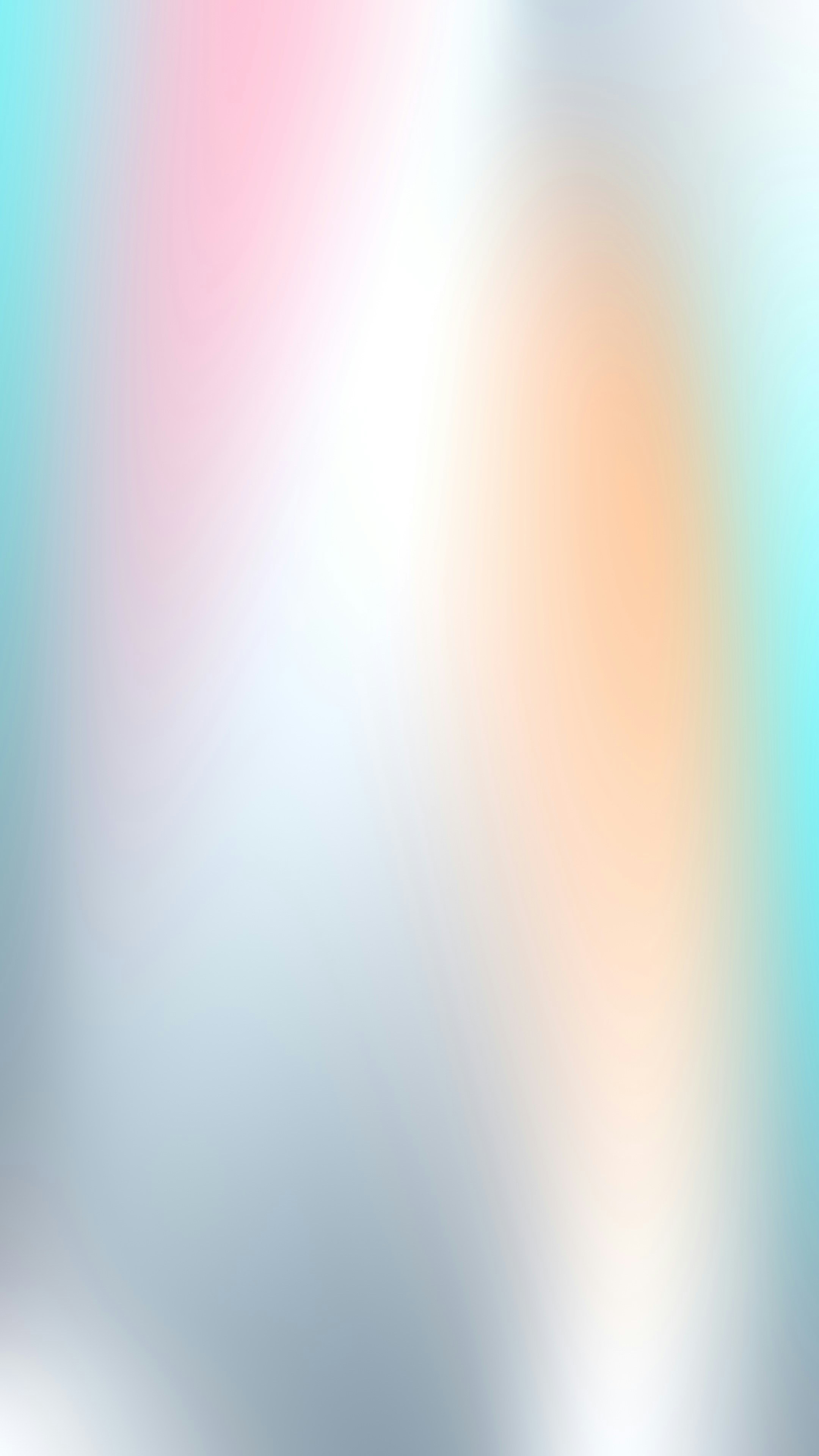 A soft gradient shifting from pale blue to warm peach and white