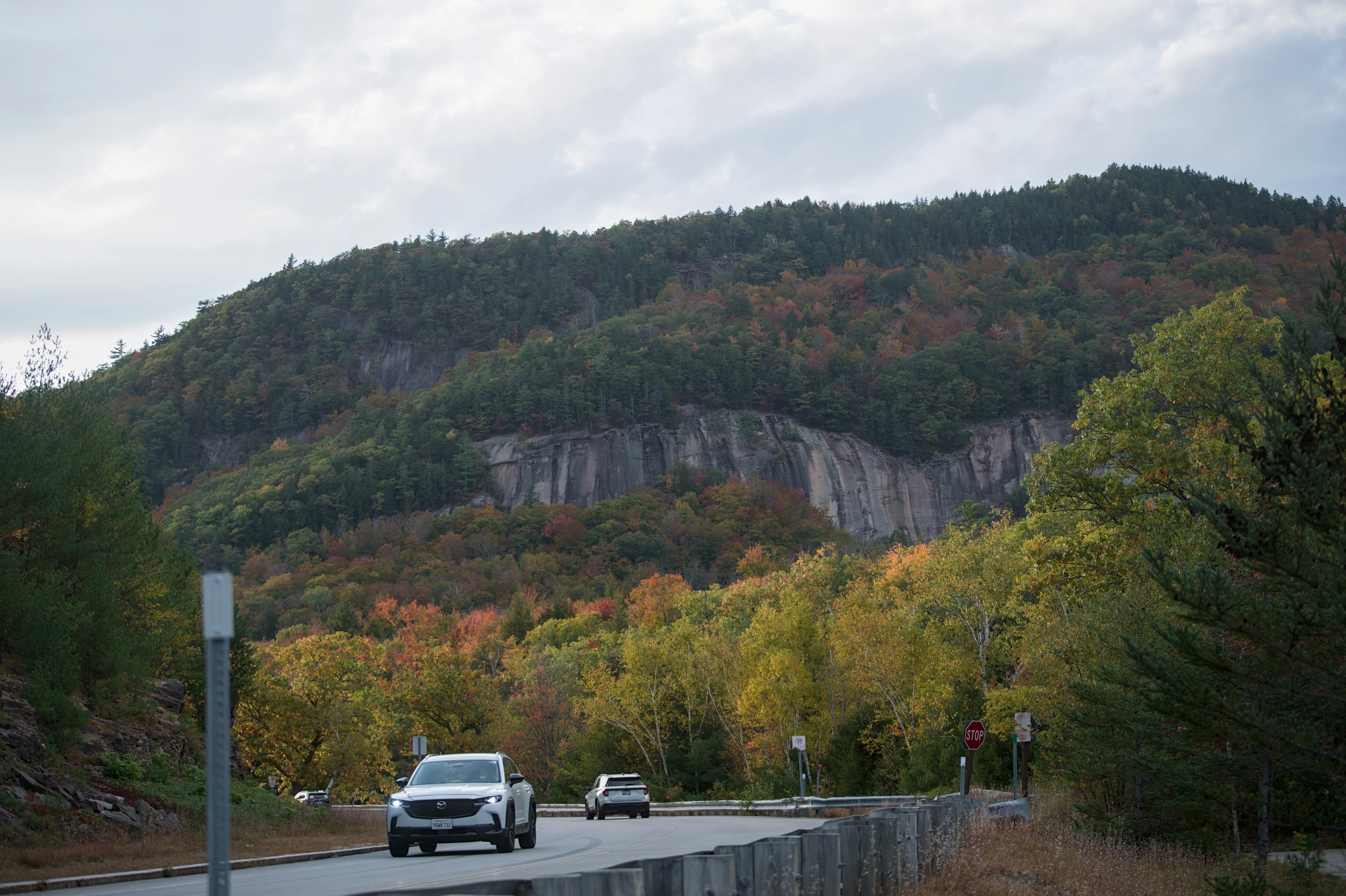 Cars on road with autumn mountain - Free Photo on Unsplash