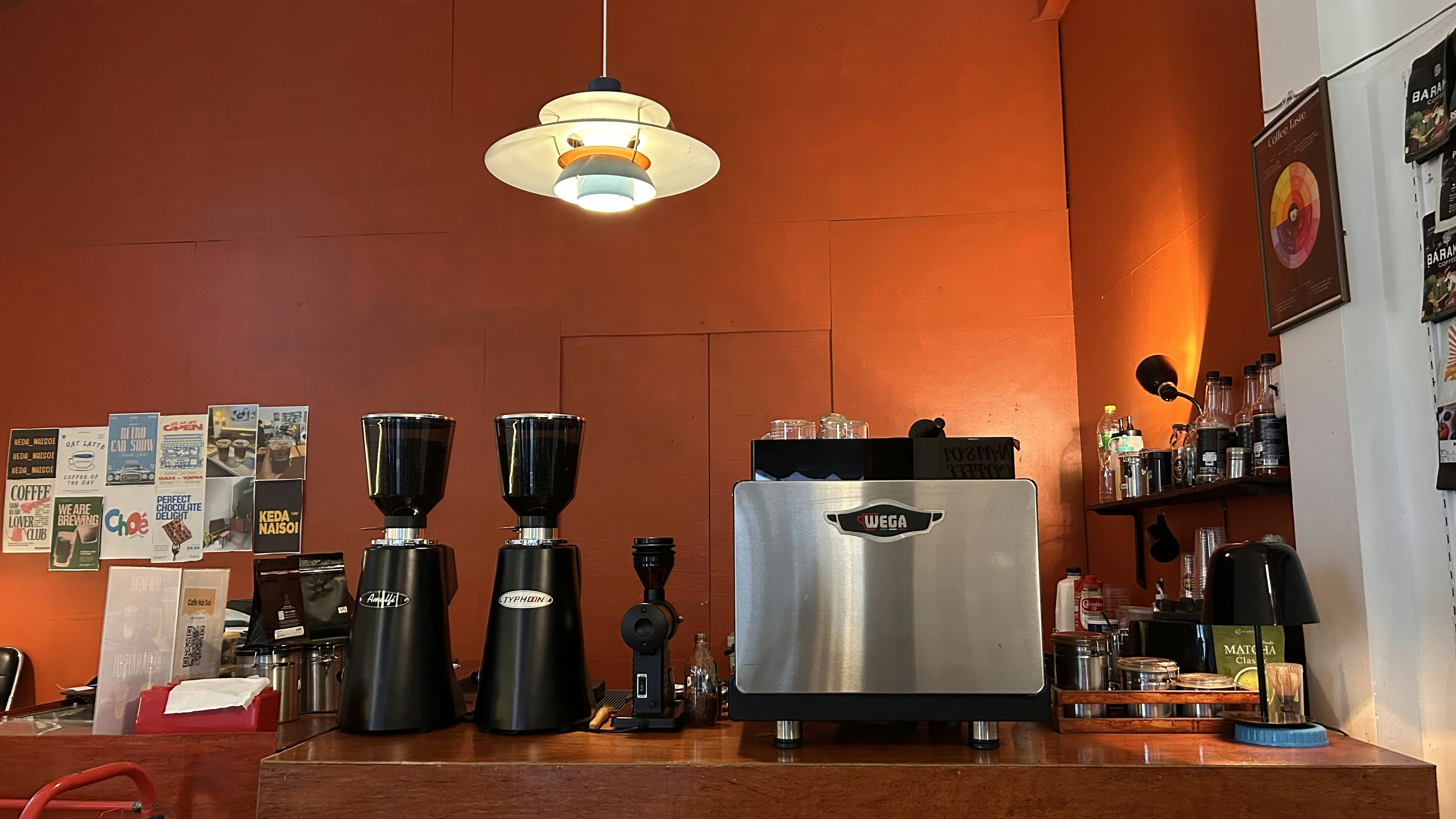 Espresso machine and grinders on counter - Free Photo on Unsplash