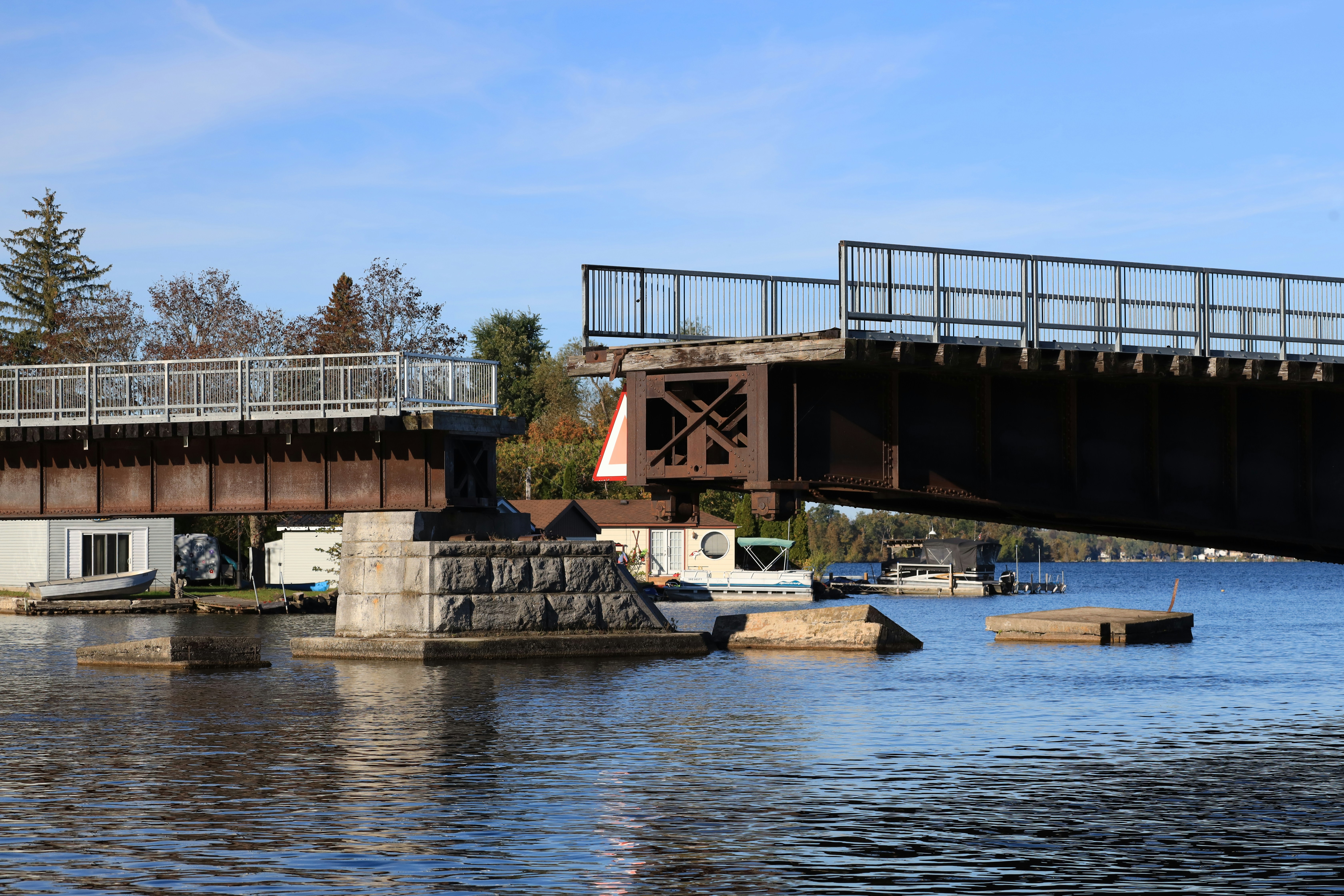 Raised drawbridge over calm river - Free Photo on Unsplash