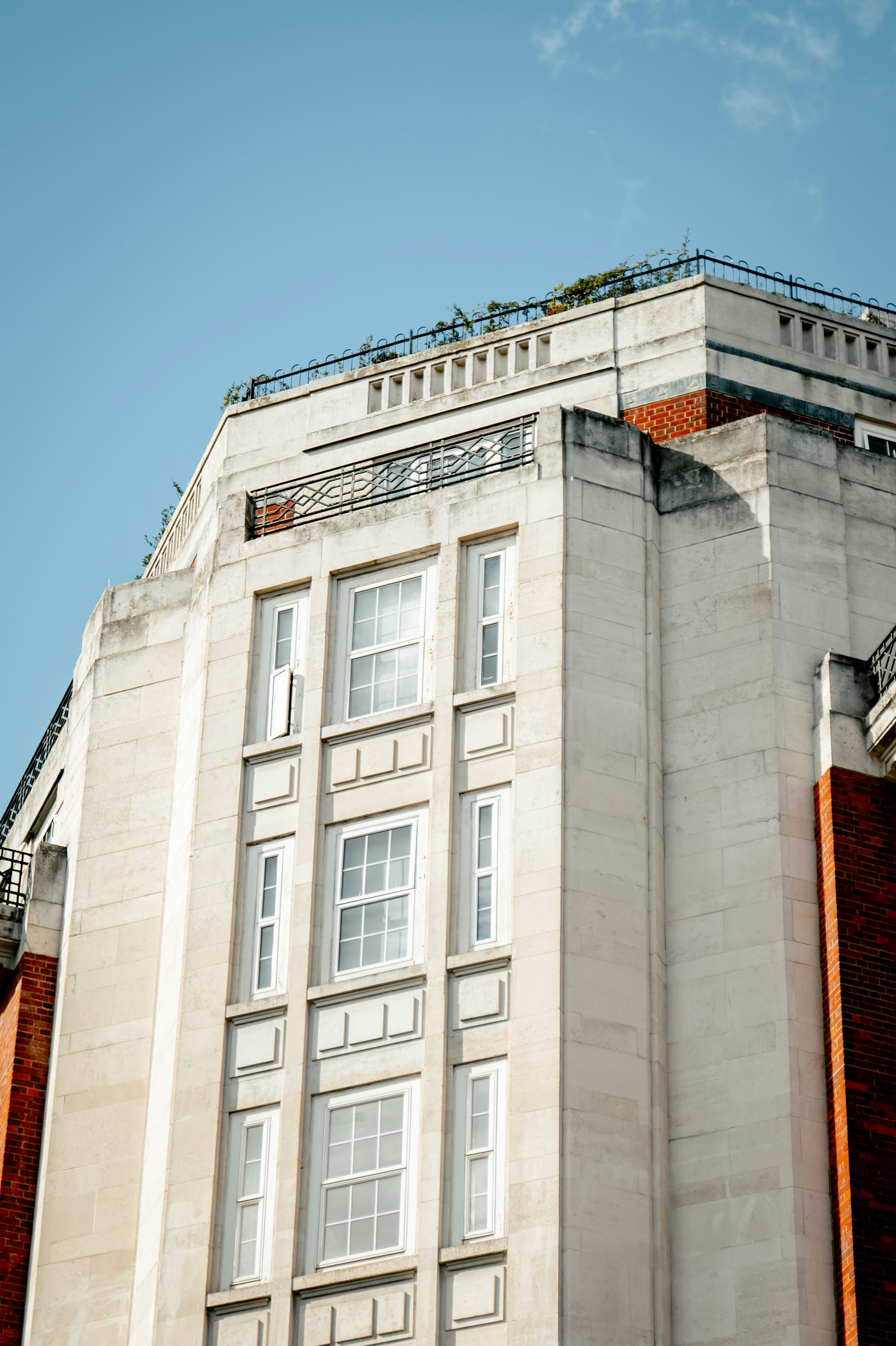 Stone building facade with brick accents - Free Photo on Unsplash
