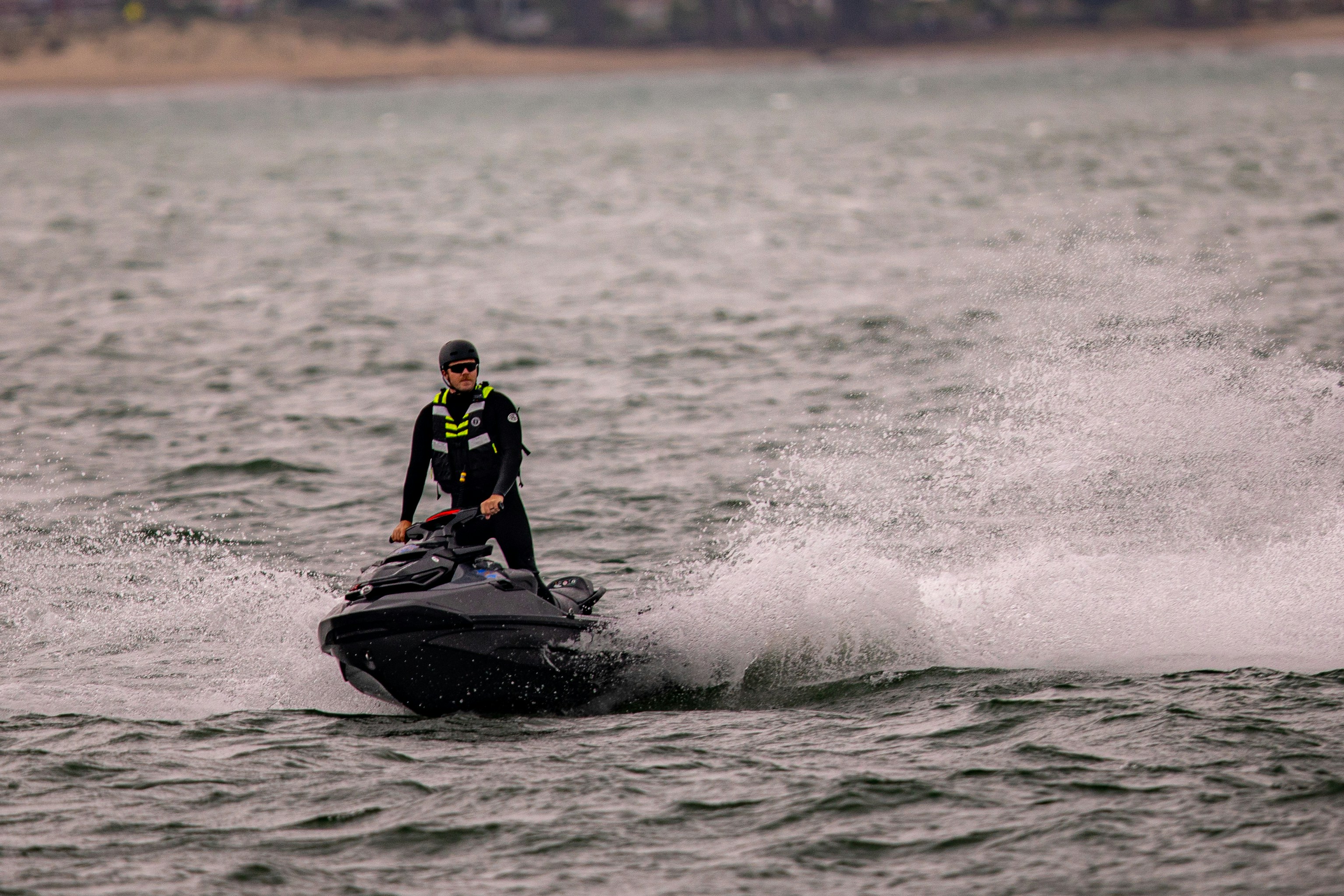 Person riding jet ski on ocean - Free Photo on Unsplash