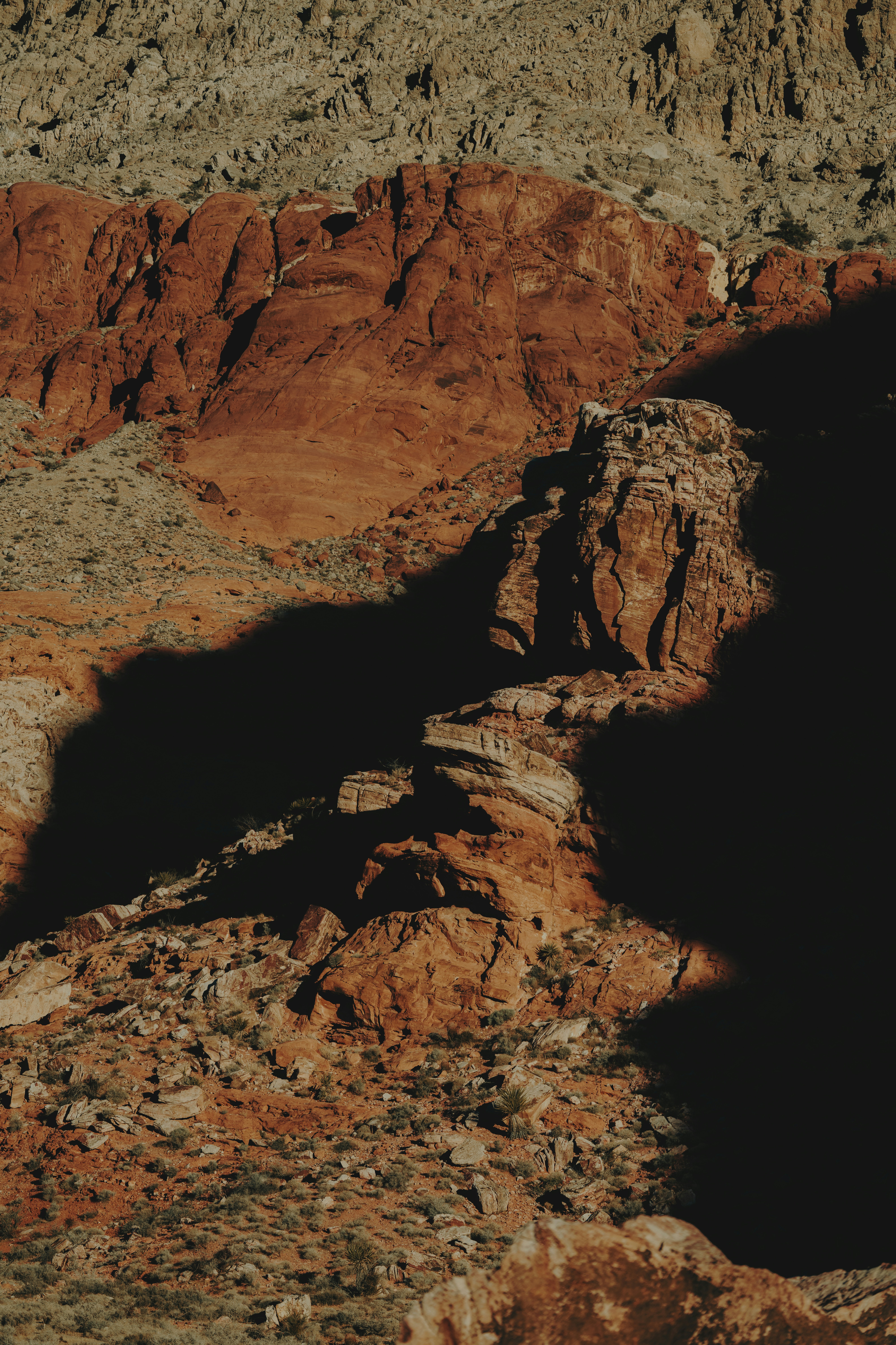 Red sandstone rocks with deep shadows - Free Photo on Unsplash