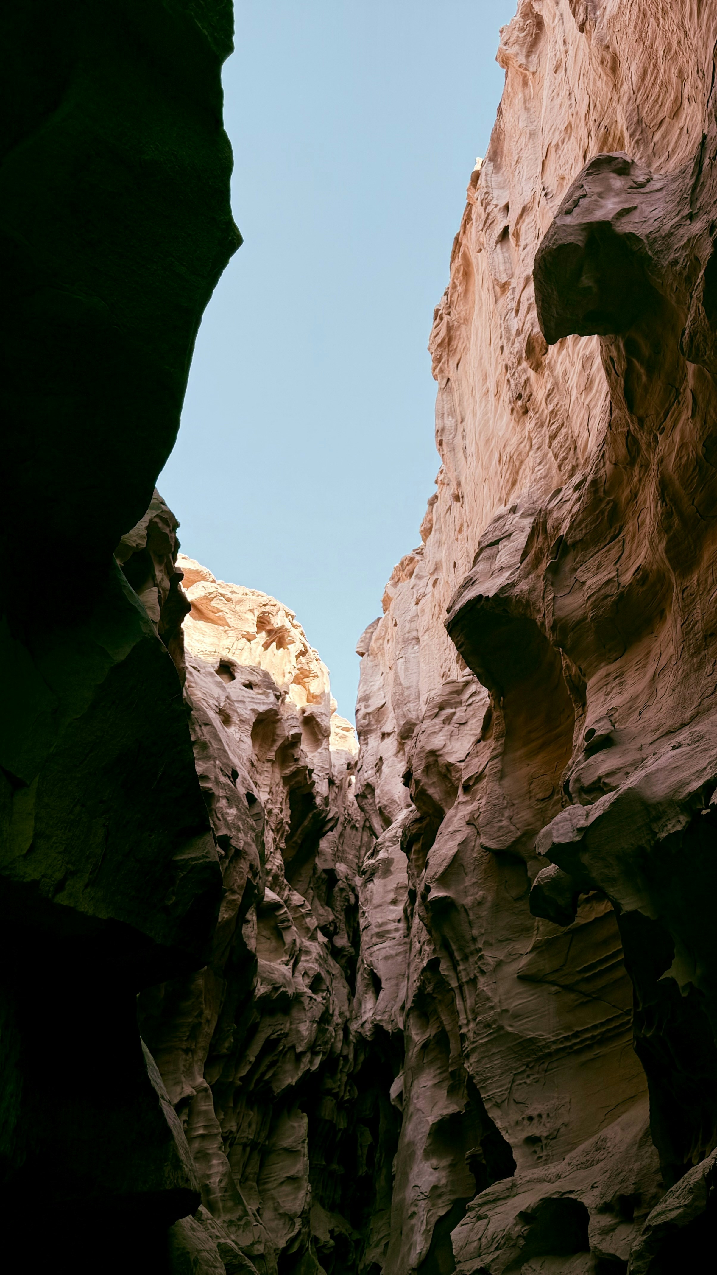 Narrow slot canyon with sandstone walls - Free Photo on Unsplash