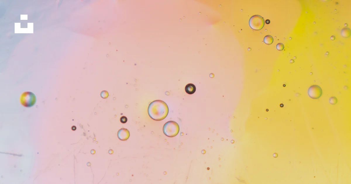 Pinnk Gradient Oil droplets on yellow pink gradient - Free Photo on Unsplash