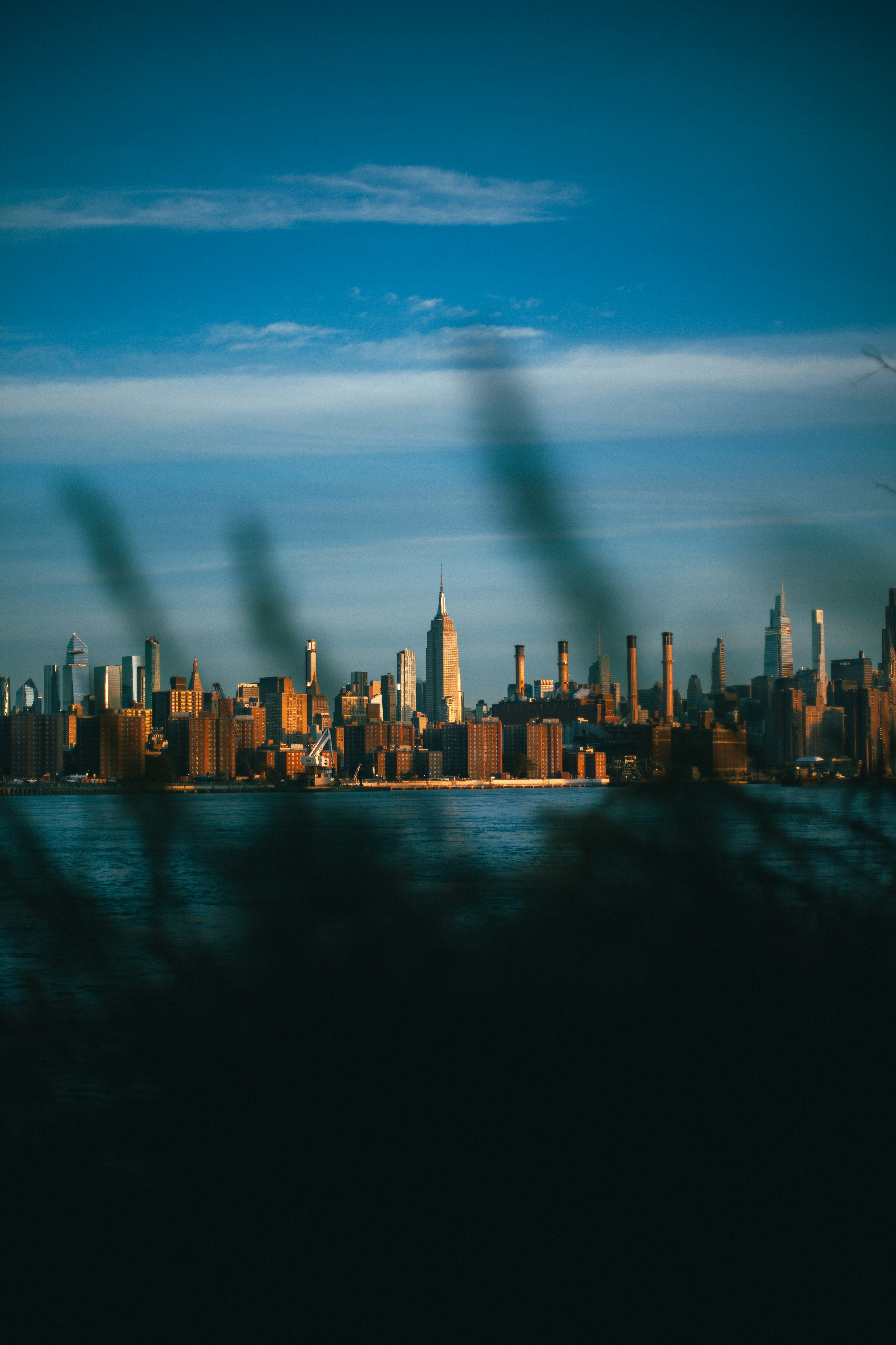 The Empire State Building and Manhattan skyline across the East River in New York City