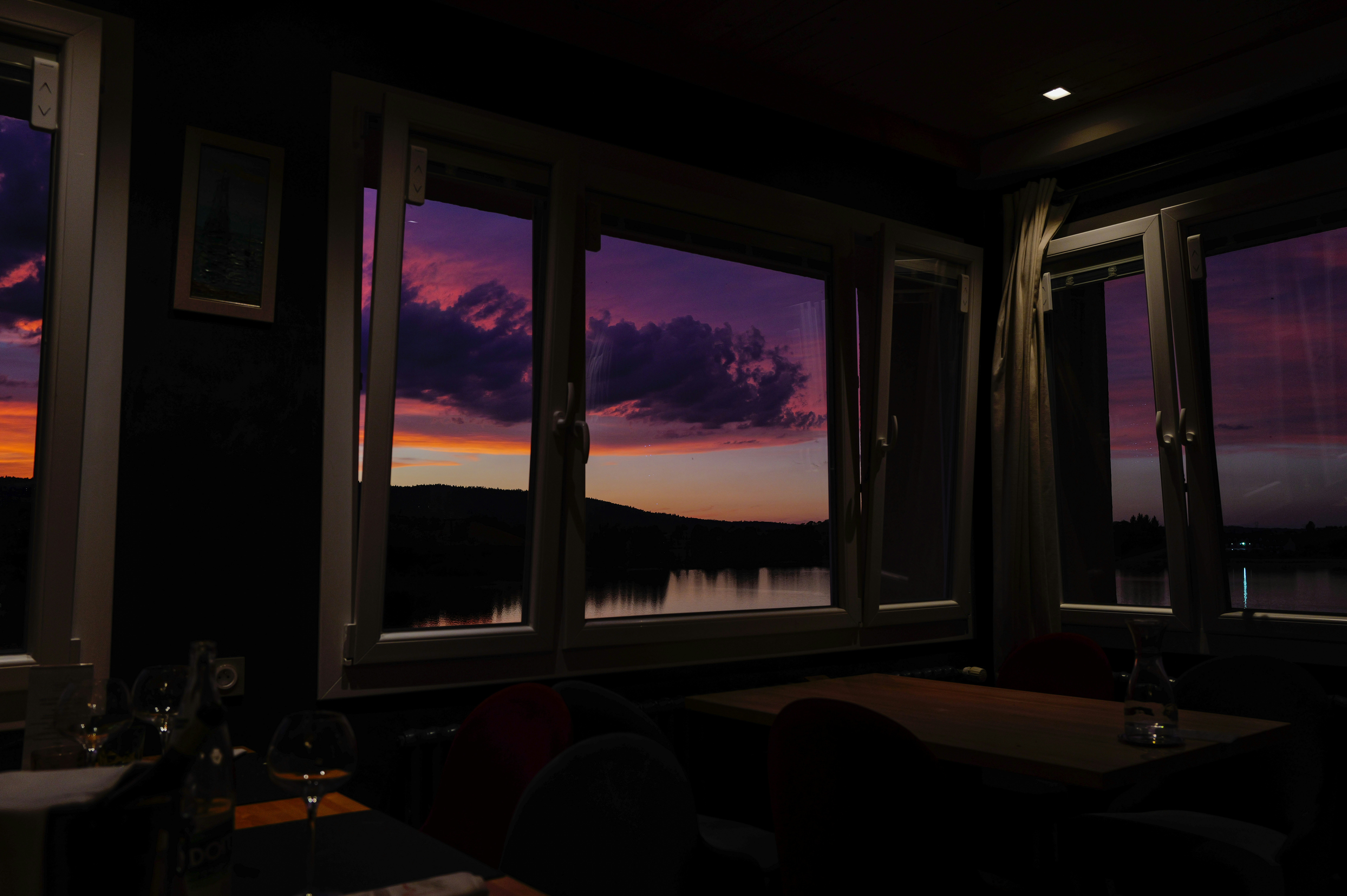 Lake view through window at night - Free Photo on Unsplash