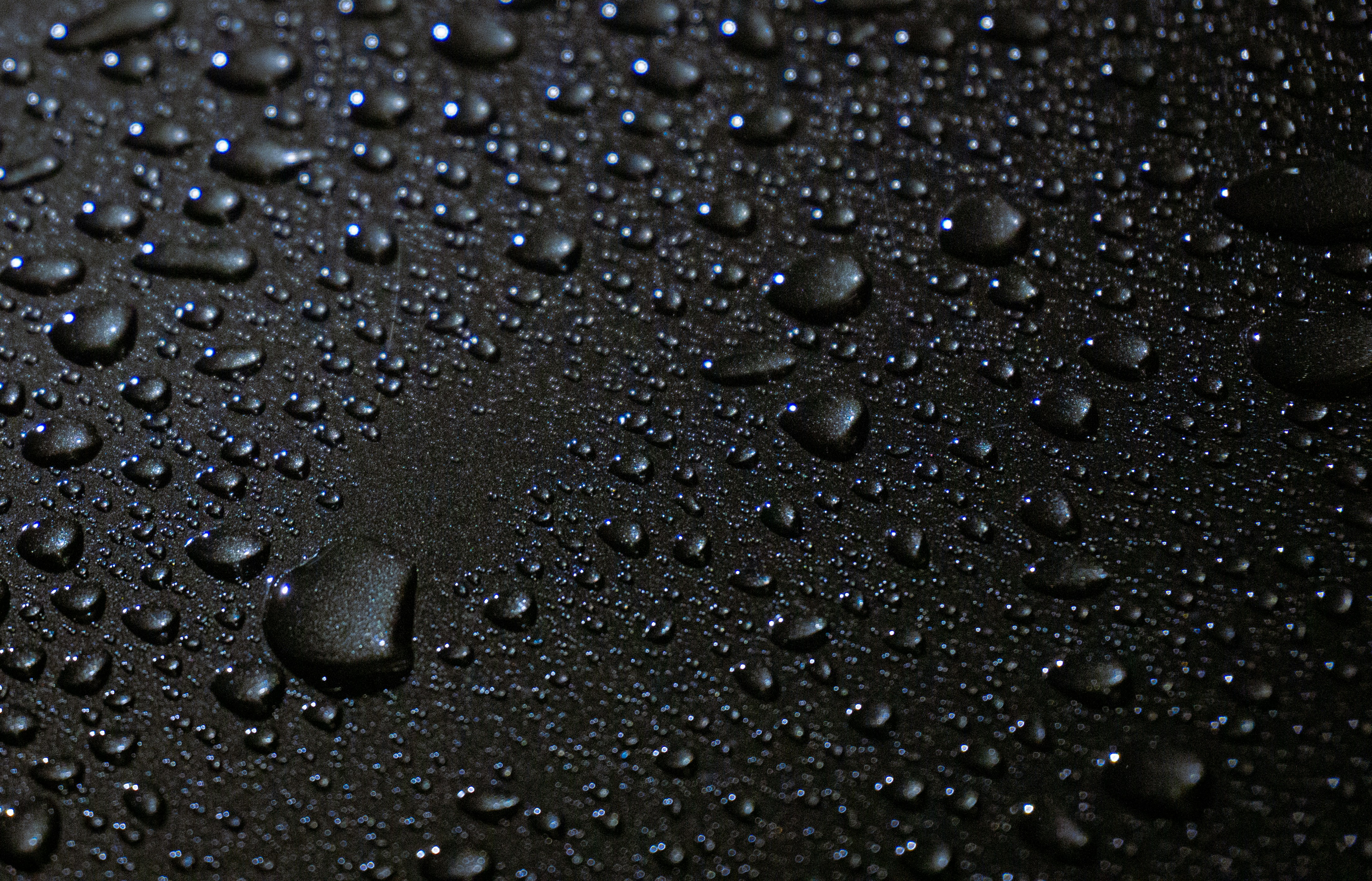 Water droplets on dark texture - Free Photo on Unsplash