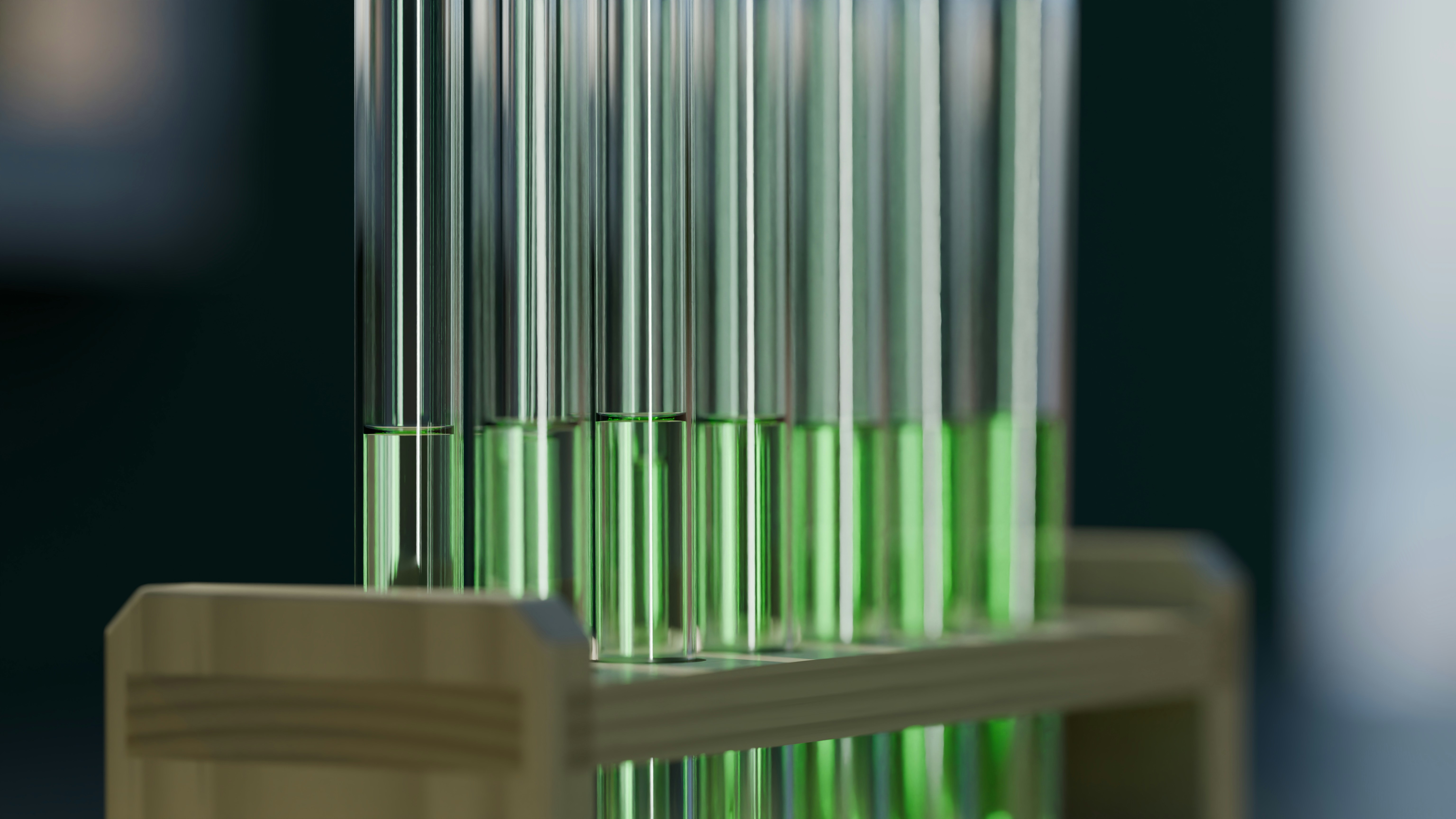 A thin meniscus line curves across a transparent glass surface in a minimal study of liquid and light.