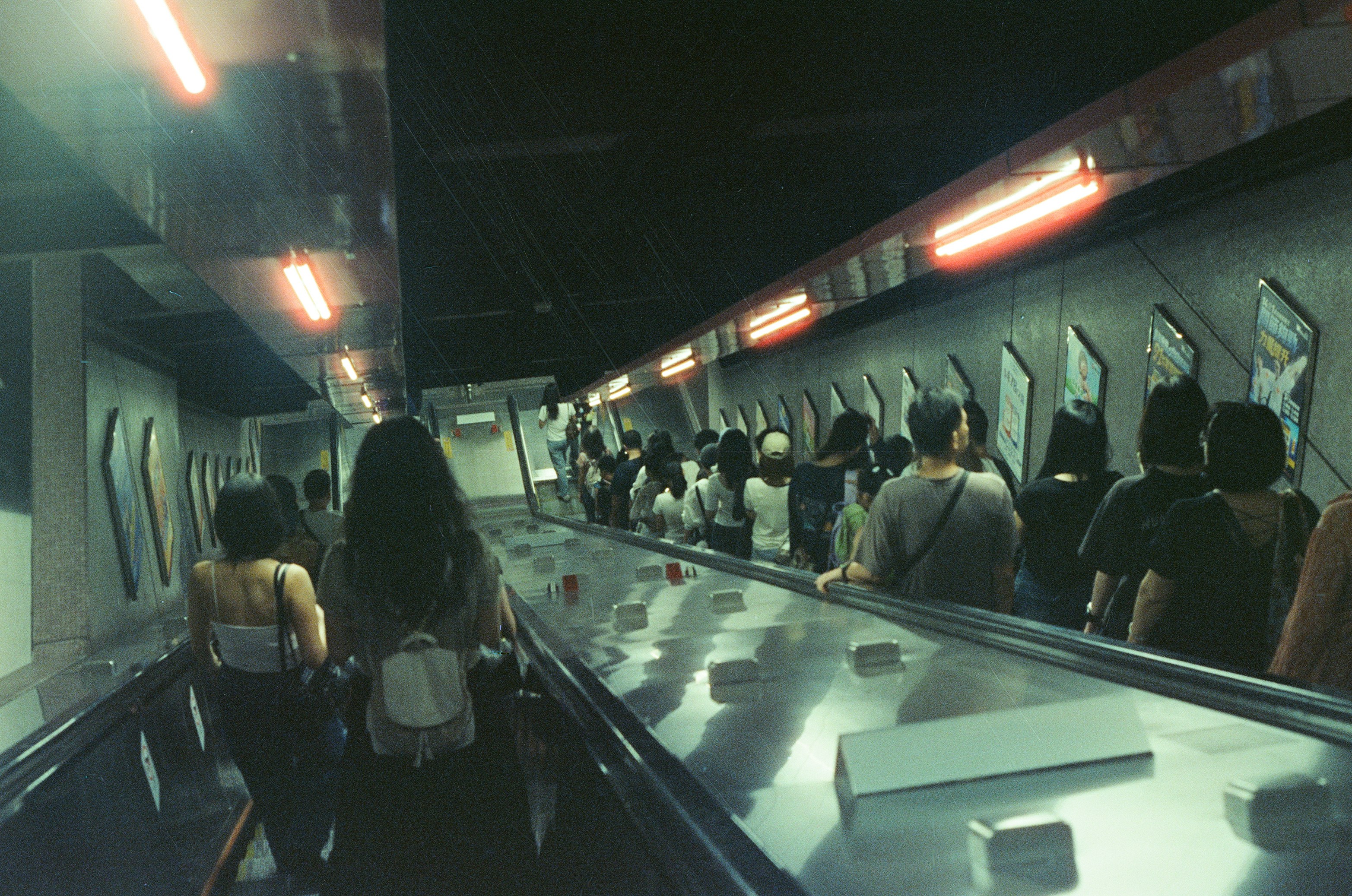 People on long subway station escalator - Free Photo on Unsplash