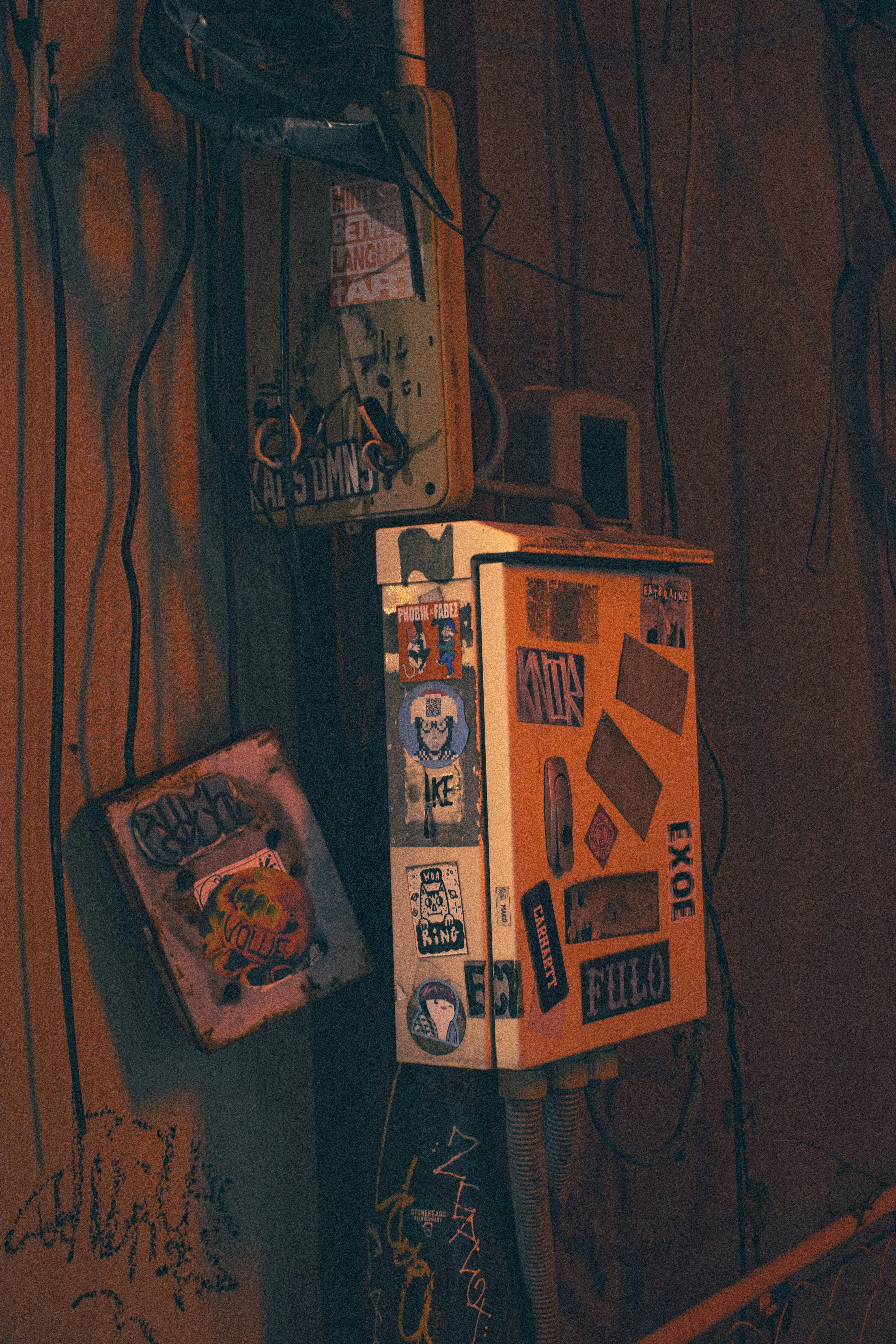 Electrical boxes with stickers and graffiti - Free Photo on Unsplash