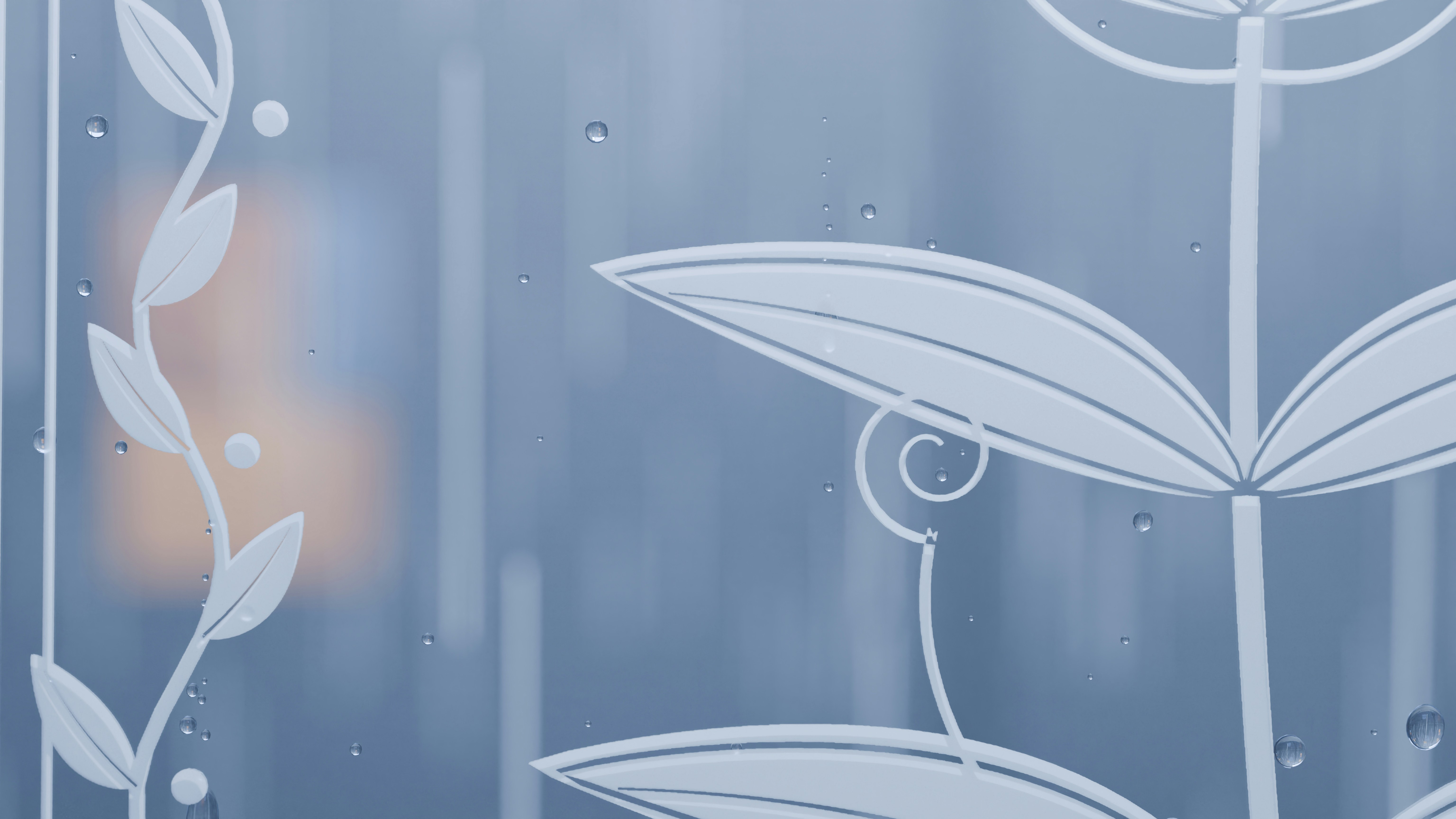 A frosted glass surface with a white etched leaf pattern and scattered water droplets