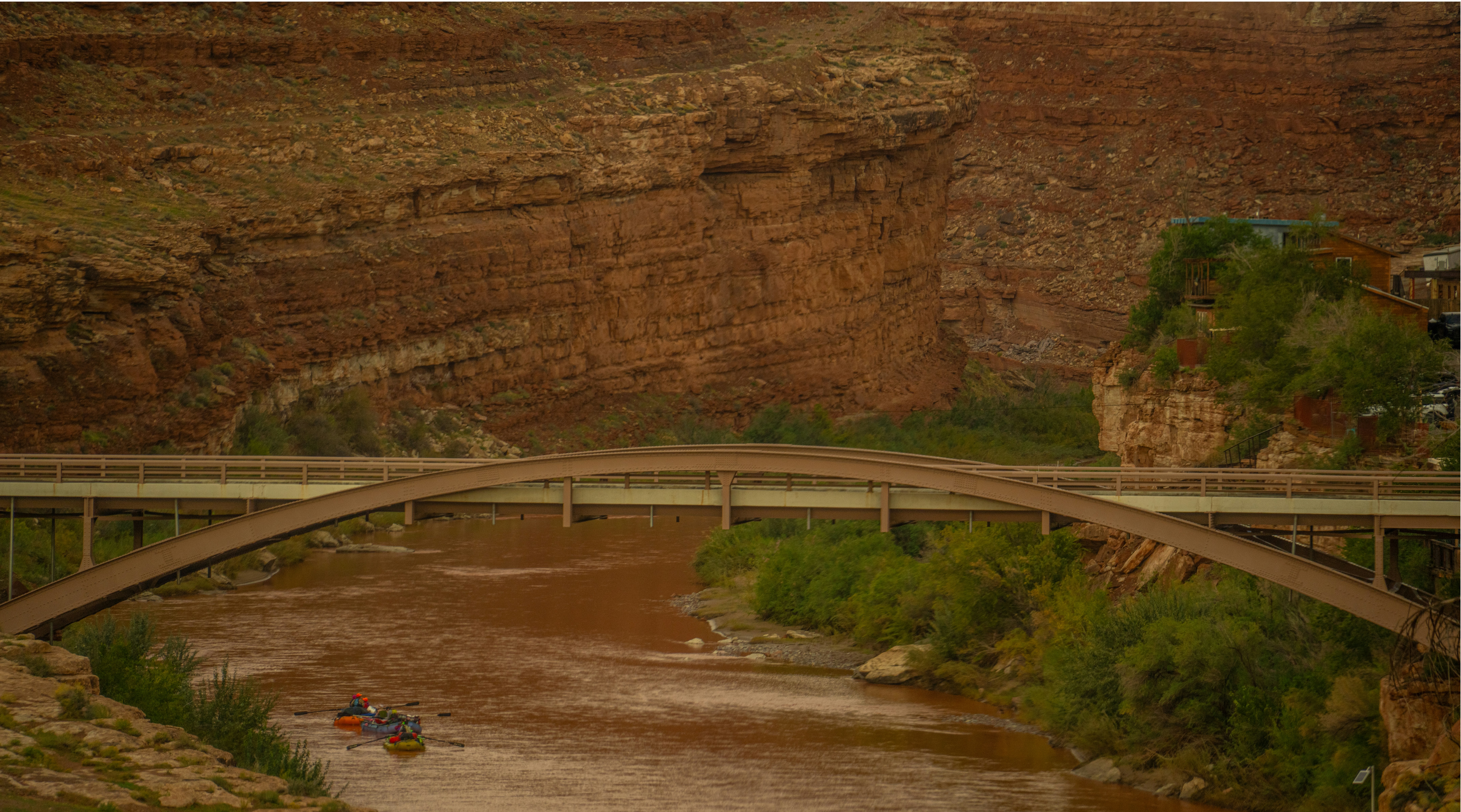 Metal arch bridge over canyon river - Free Photo on Unsplash