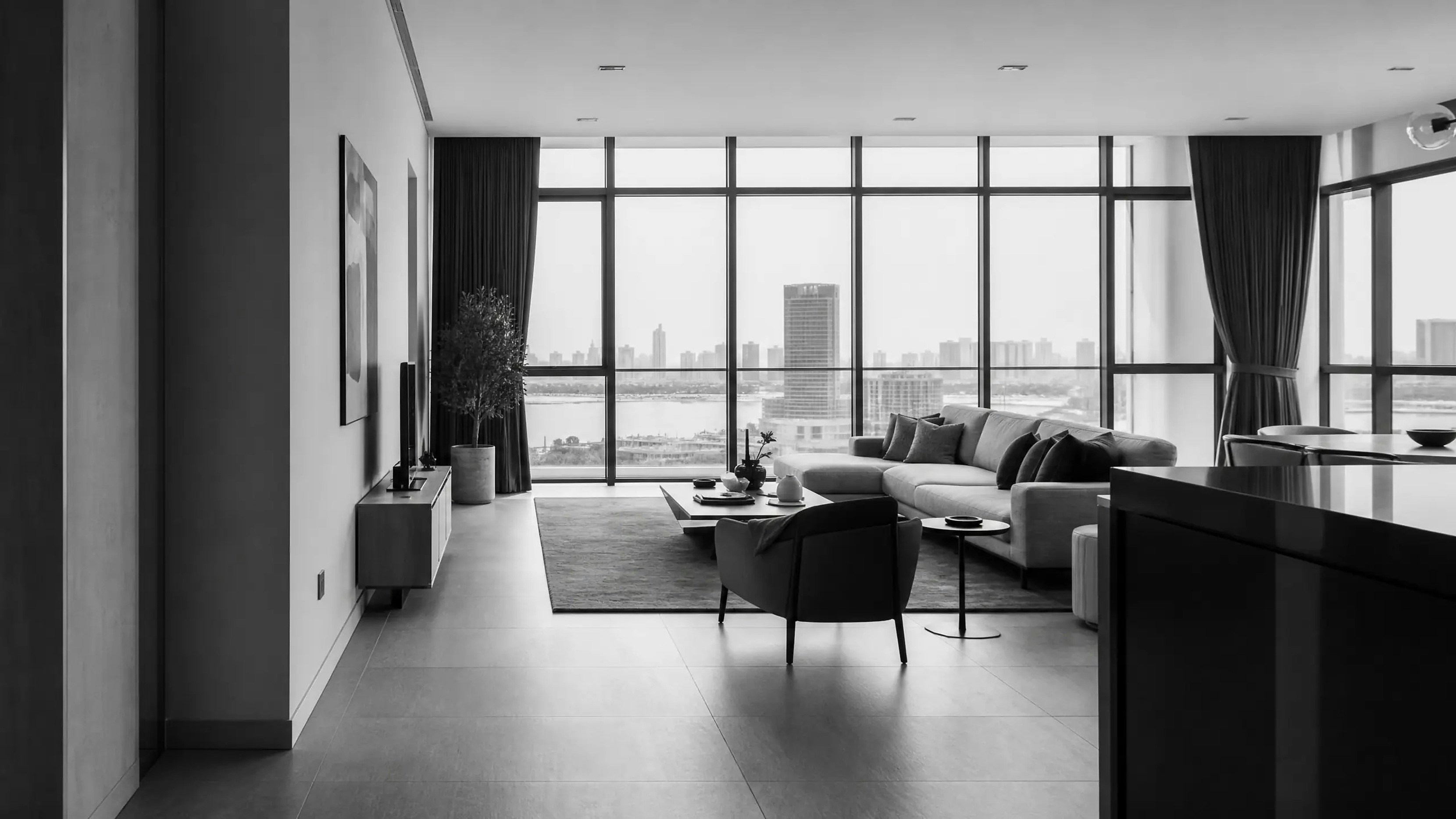 Modern living room with floor-to-ceiling windows