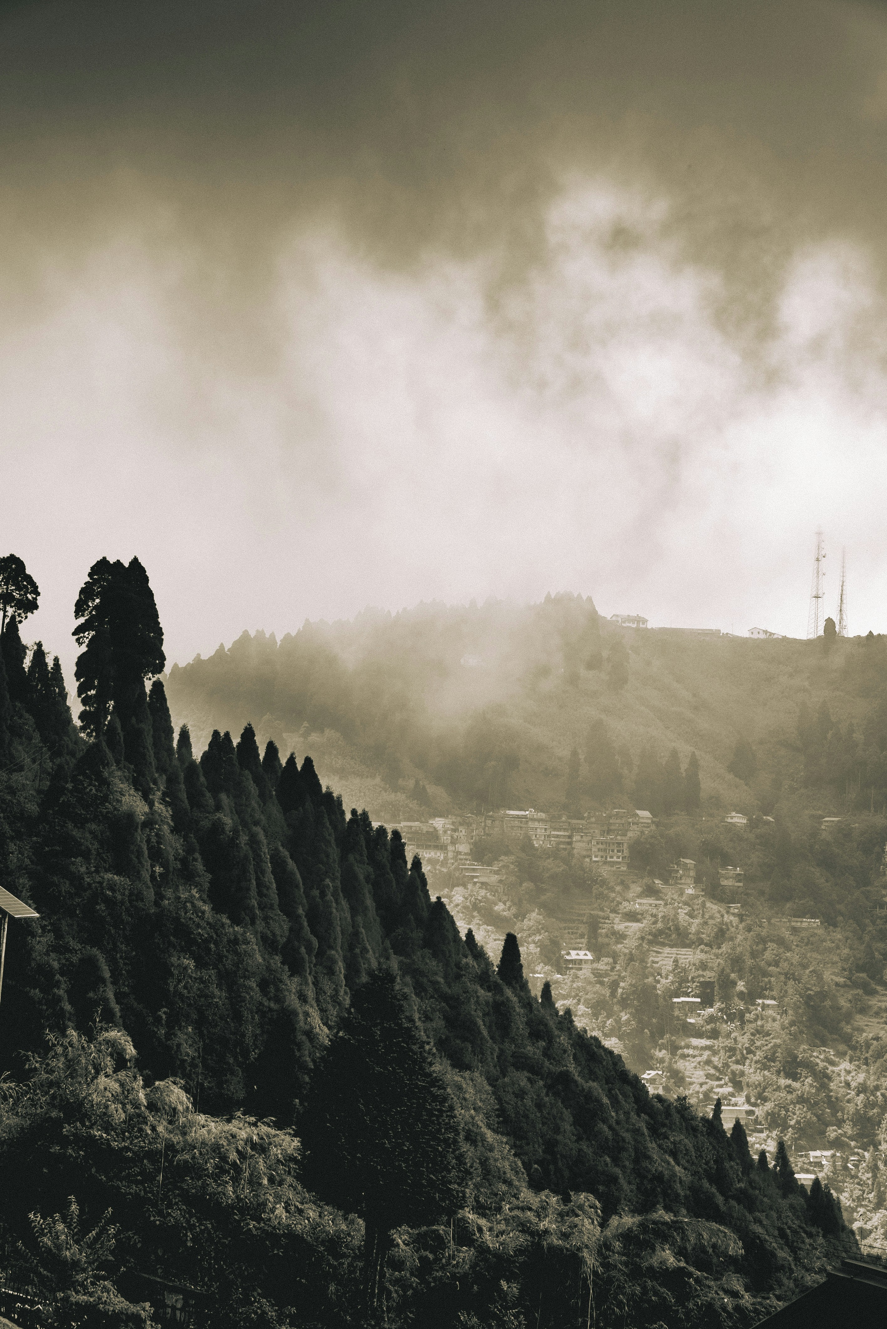 Misty mountain landscape with village - Free Photo on Unsplash