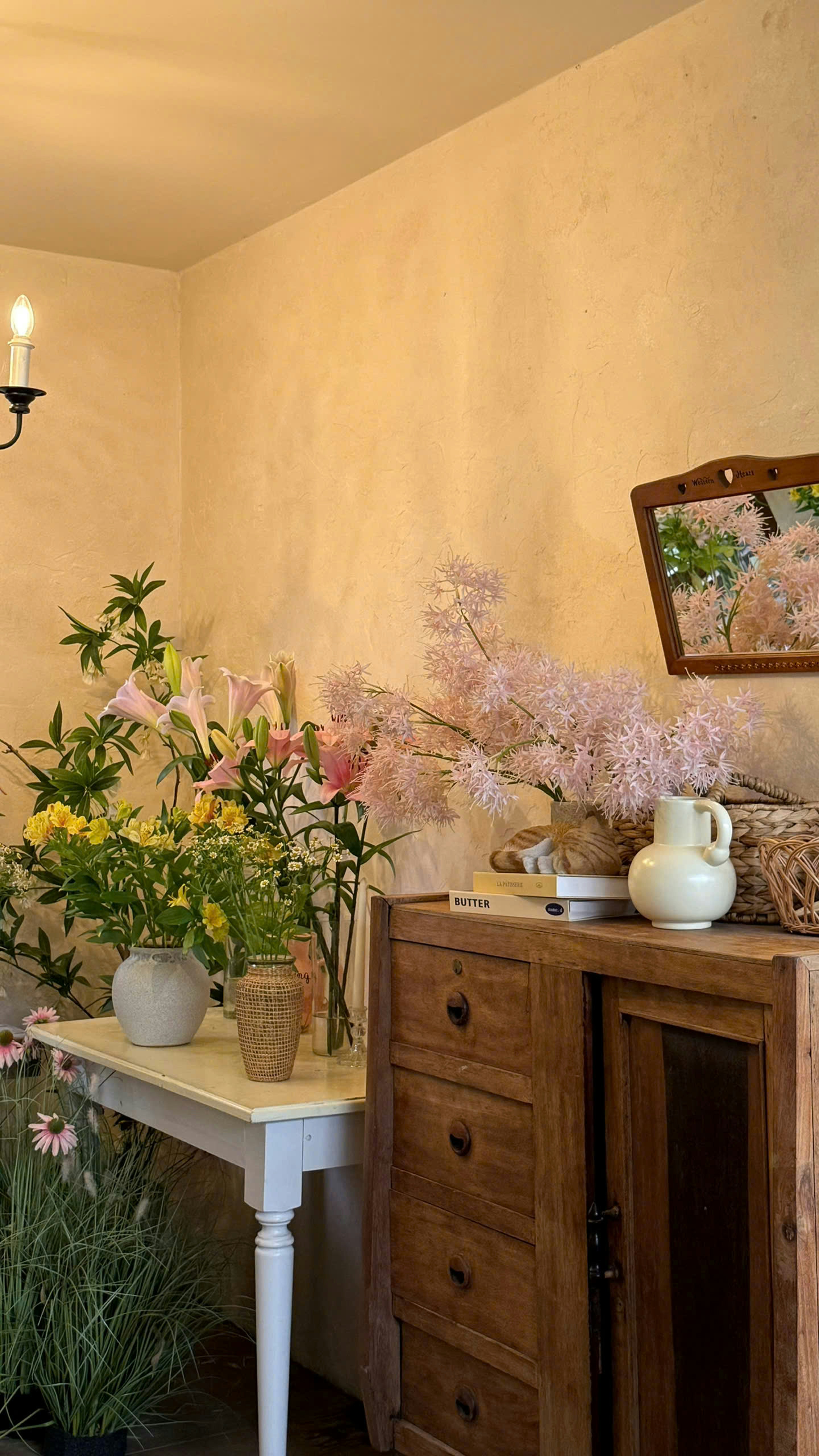 Wooden cabinet with flowers and mirror - Free Photo on Unsplash