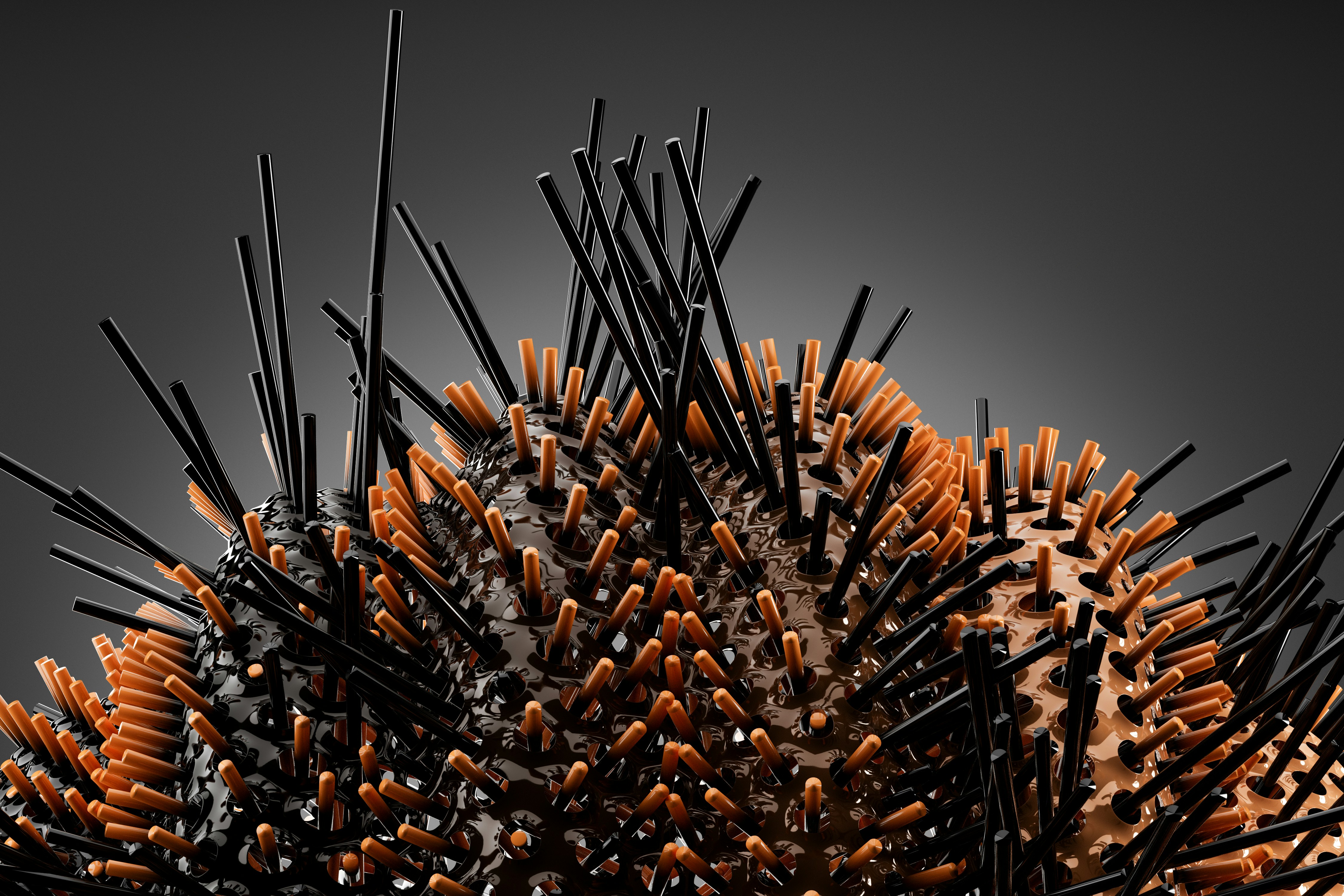 Un rendering 3D di una sfera testurizzata coperta da aste cilindriche nere e arancioni sporgenti