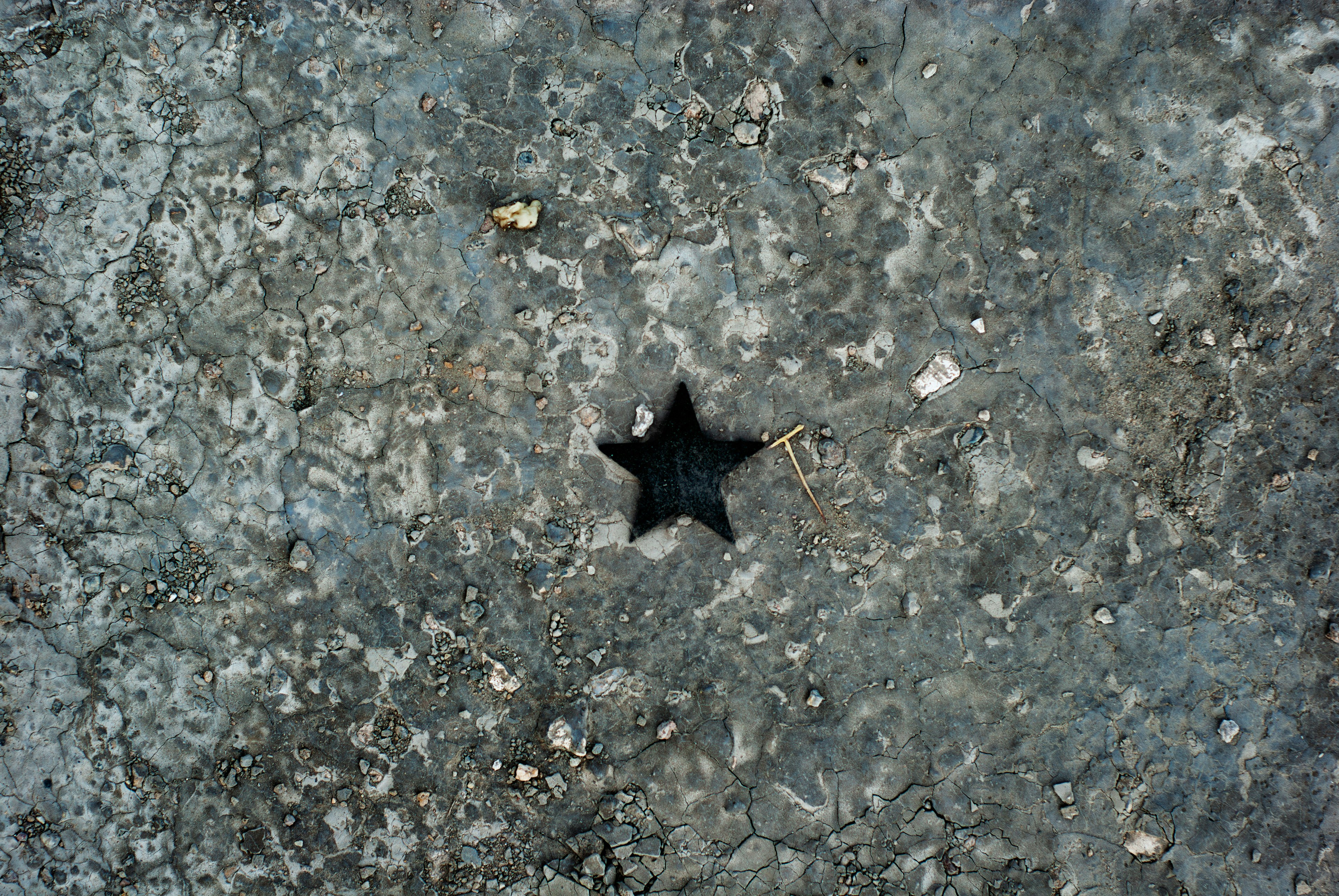 Star-shaped hole in cracked earth - Free Photo on Unsplash