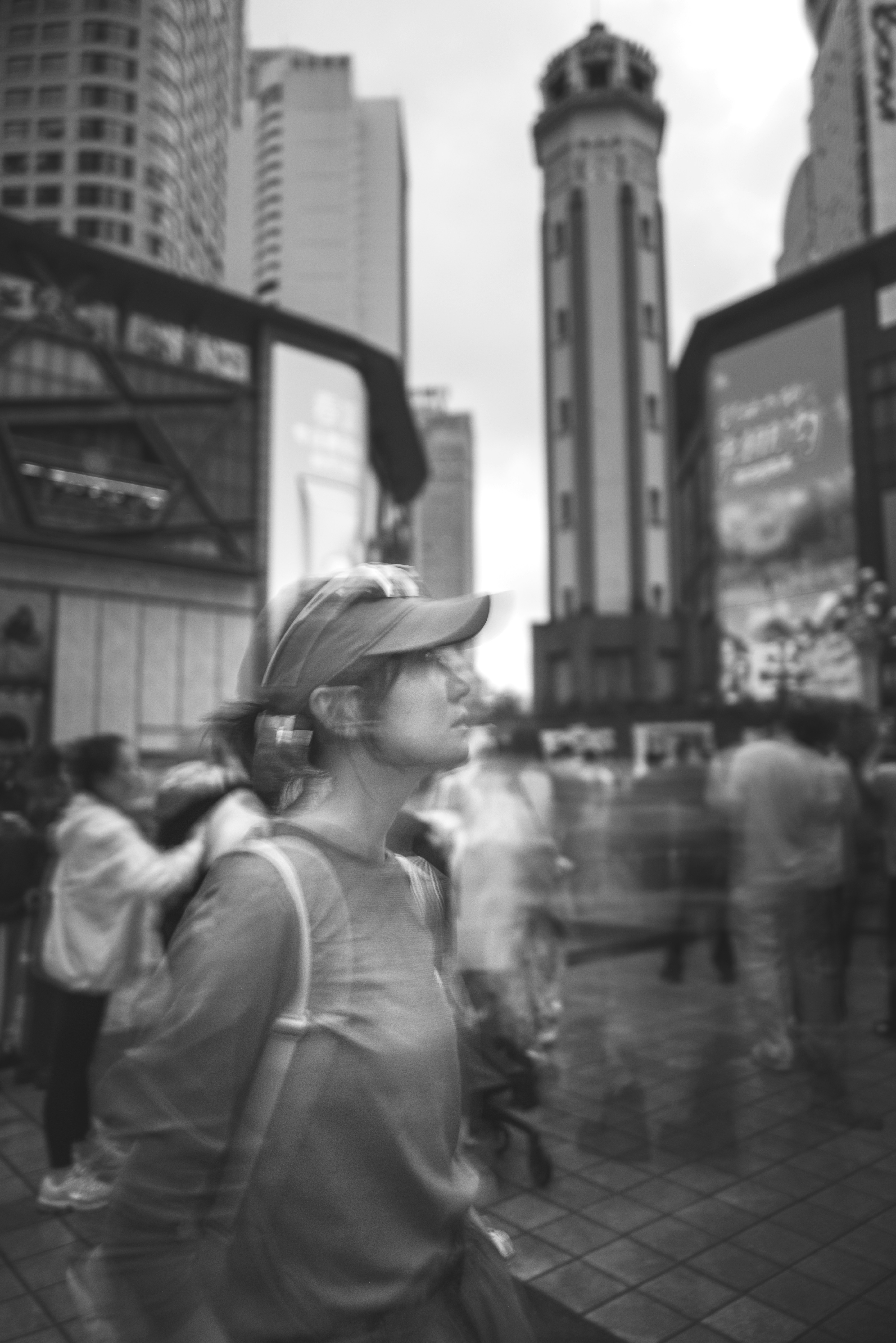 Person walking through busy city square - Free Photo on Unsplash