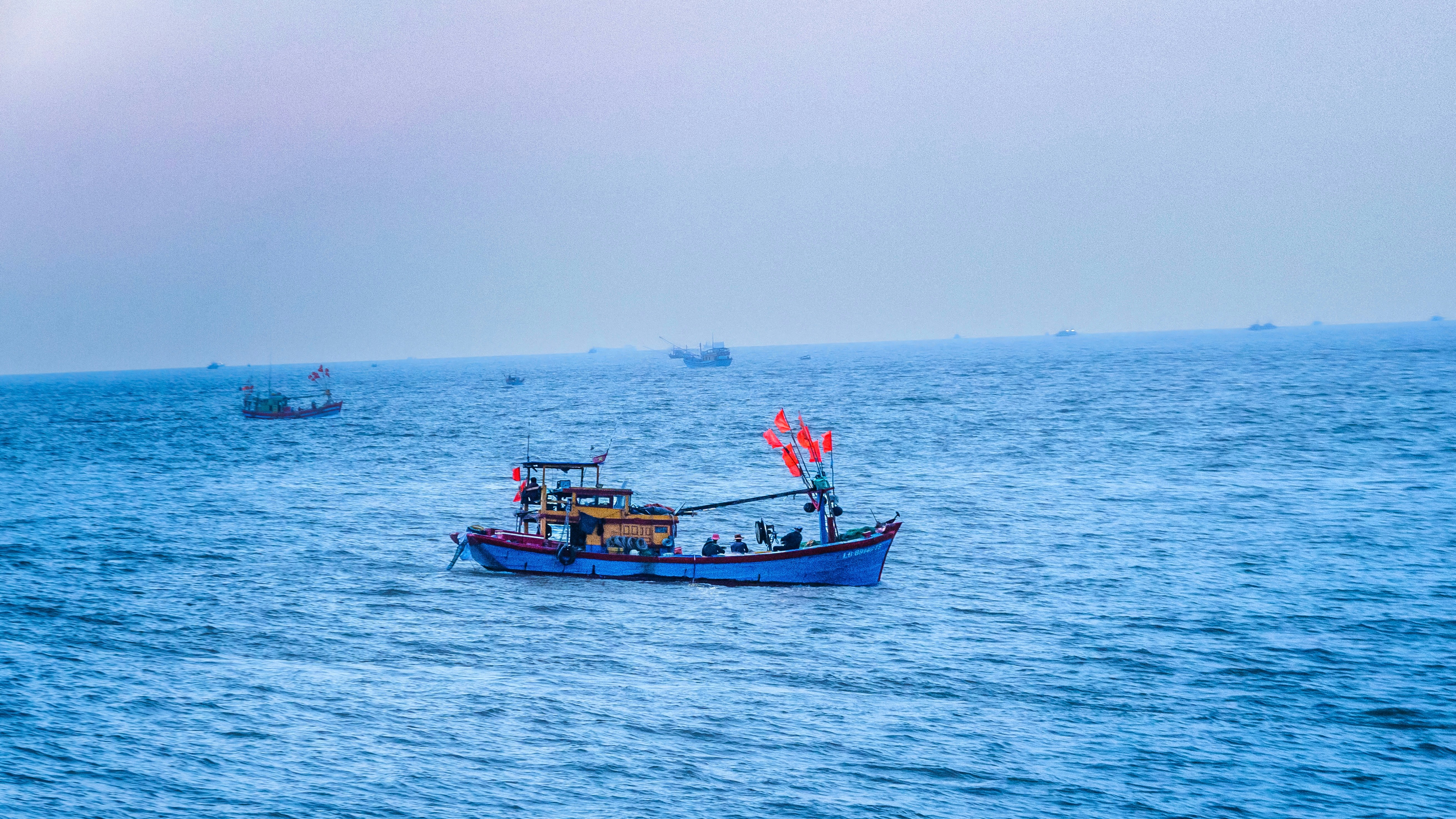 Fishing boat on open sea - Free Photo on Unsplash