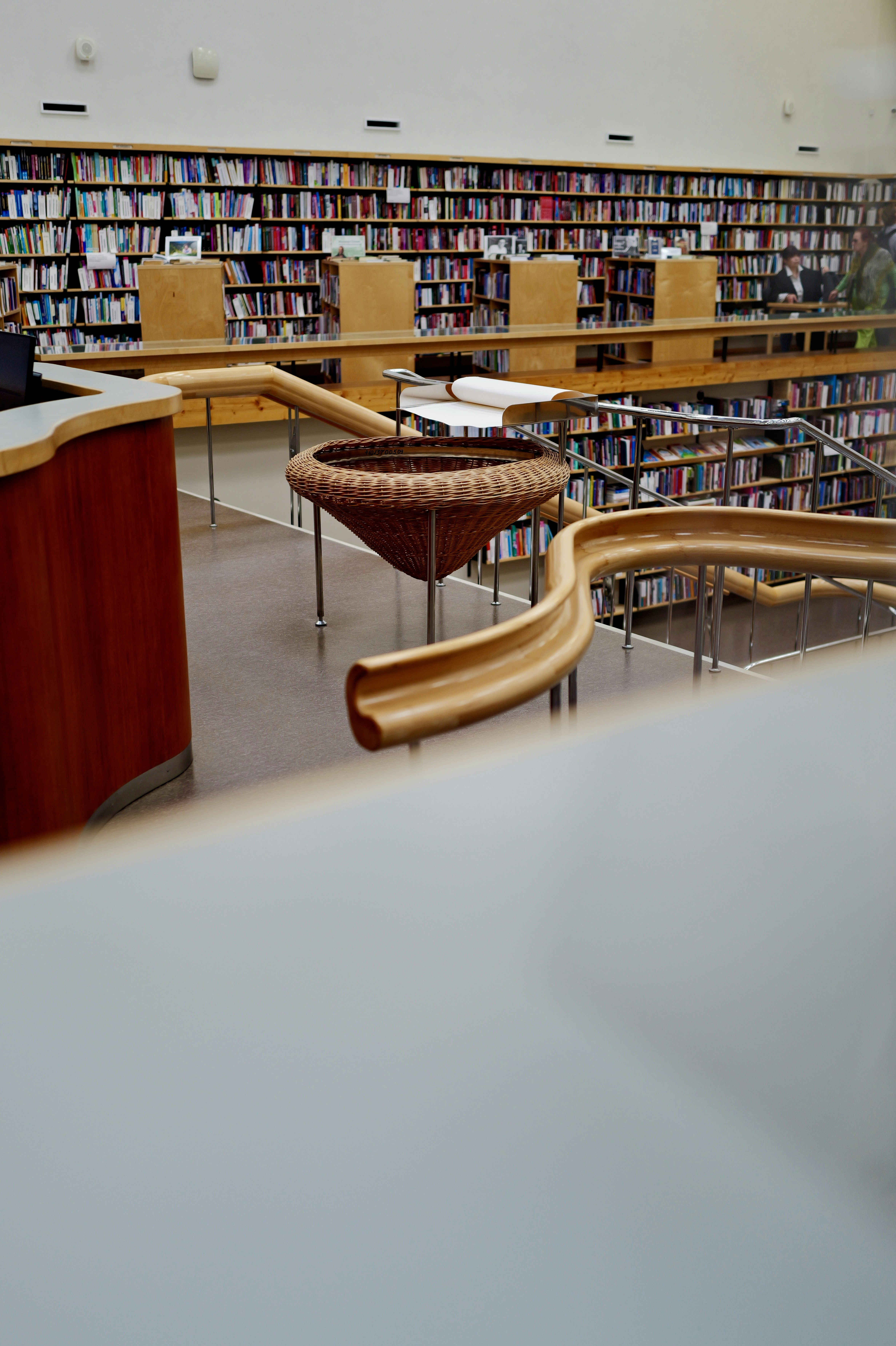 Wicker basket in library with bookshelves - Free Photo on Unsplash
