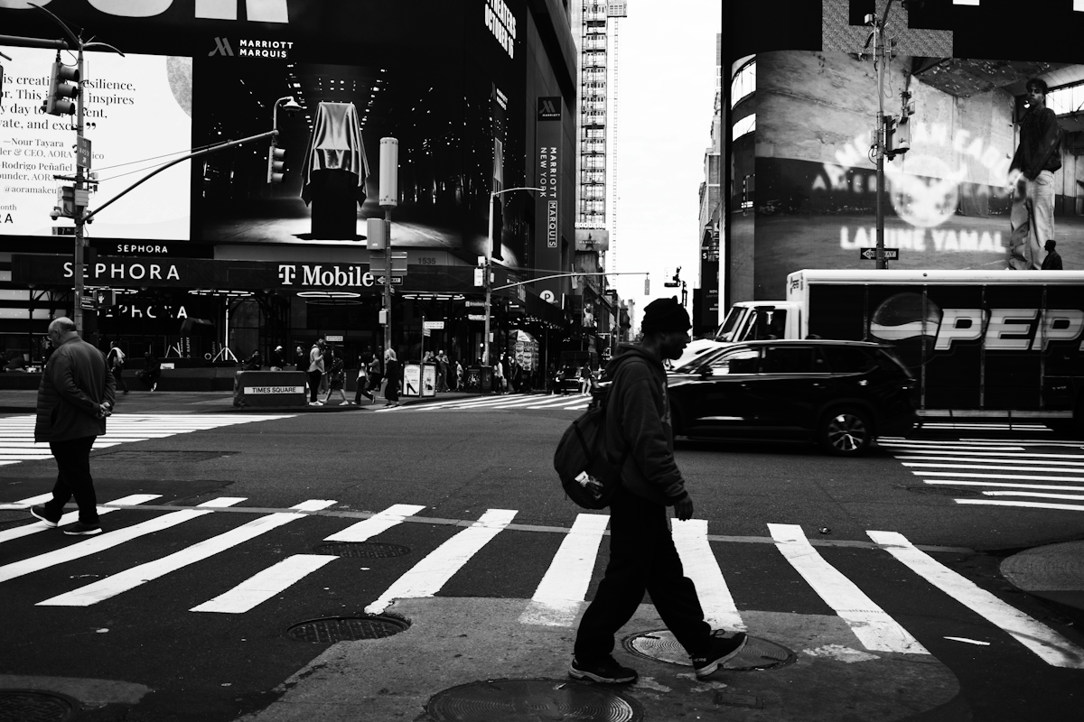 In a city where everything demands attention, humanity quietly passes unnoticed.