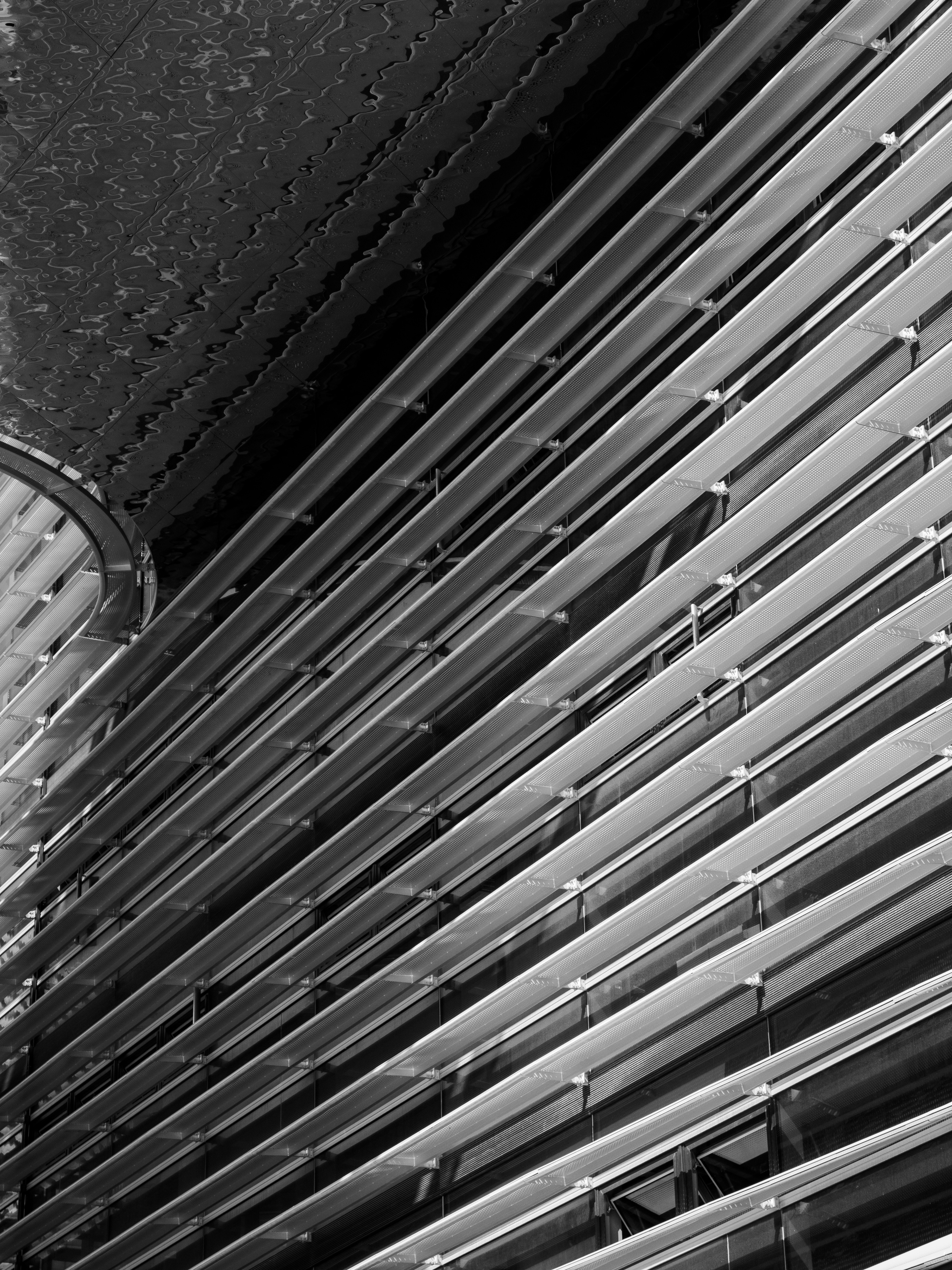 Diagonal metal louvers on building facade - Free Photo on Unsplash