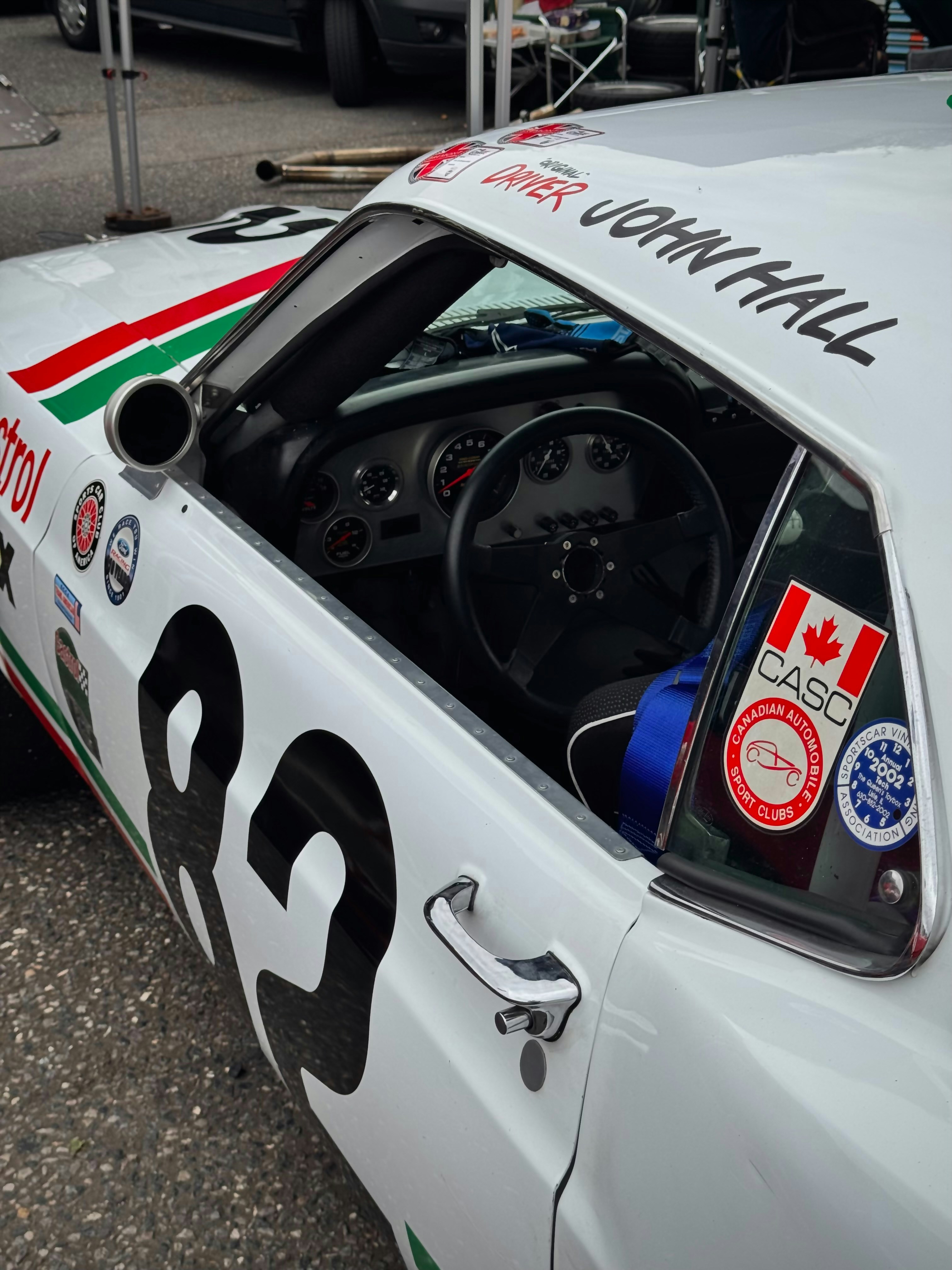 White race car with racing decals - Free Photo on Unsplash