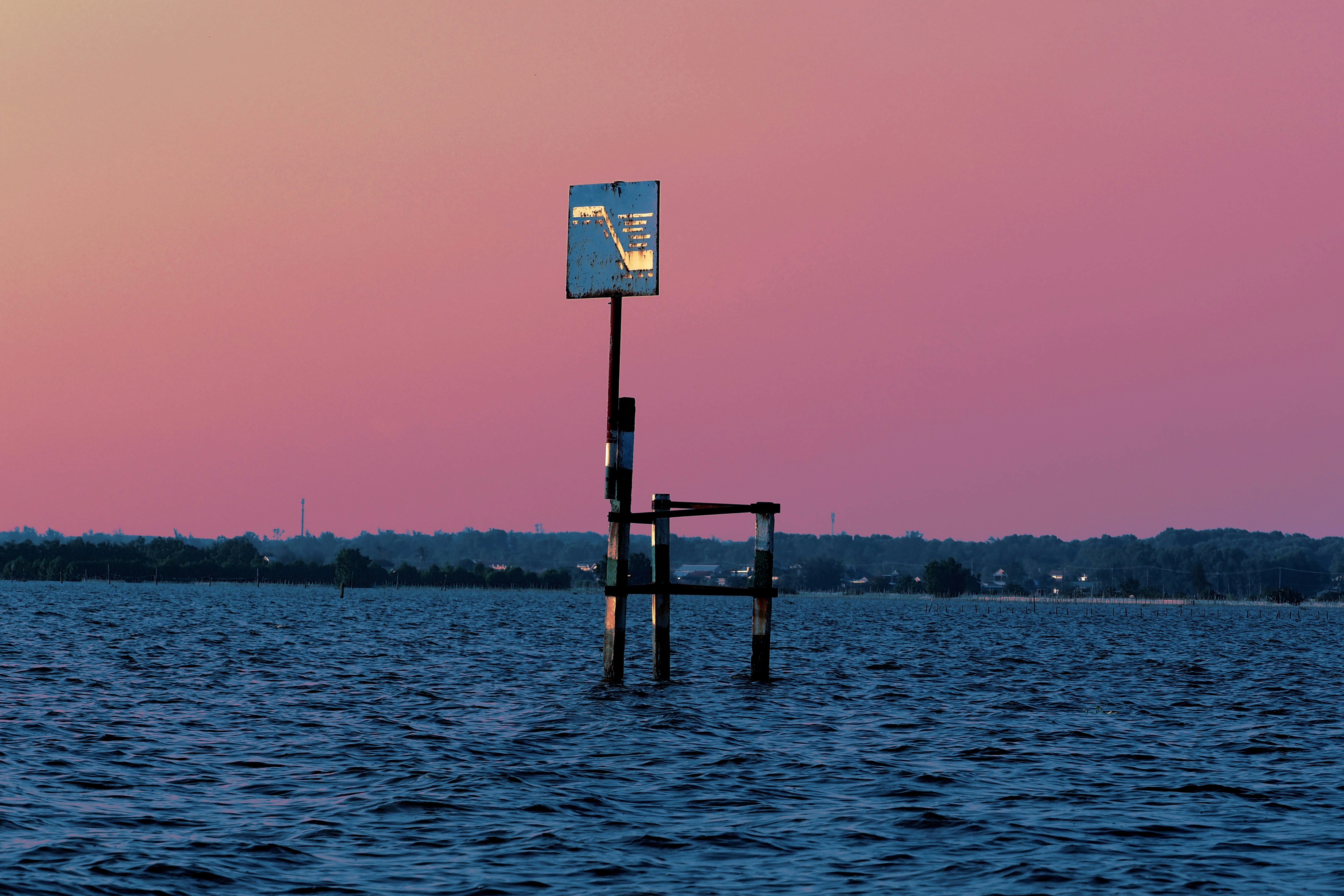 Navigation marker in calm water - Free Photo on Unsplash