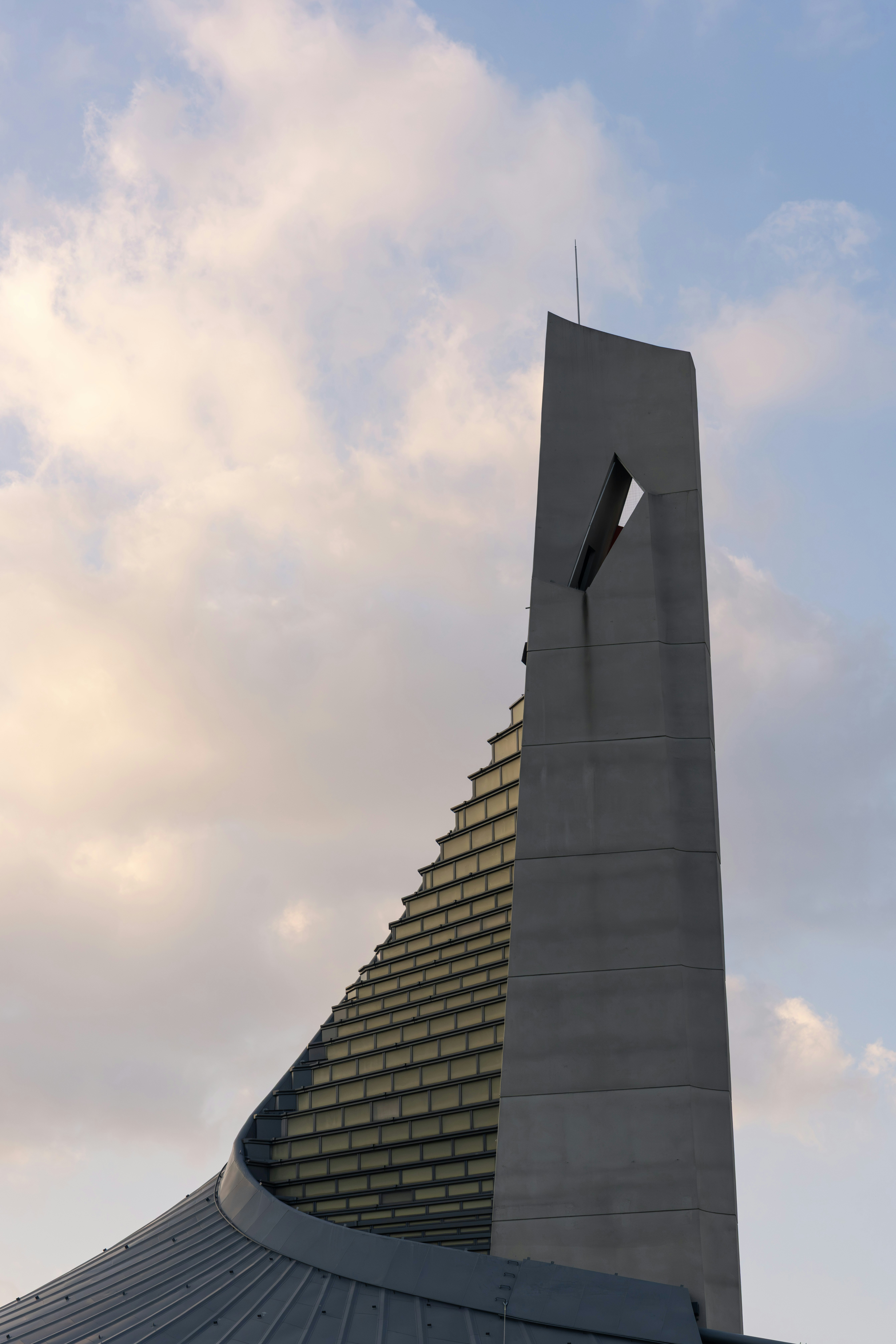 Concrete tower with triangular cutout - Free Photo on Unsplash