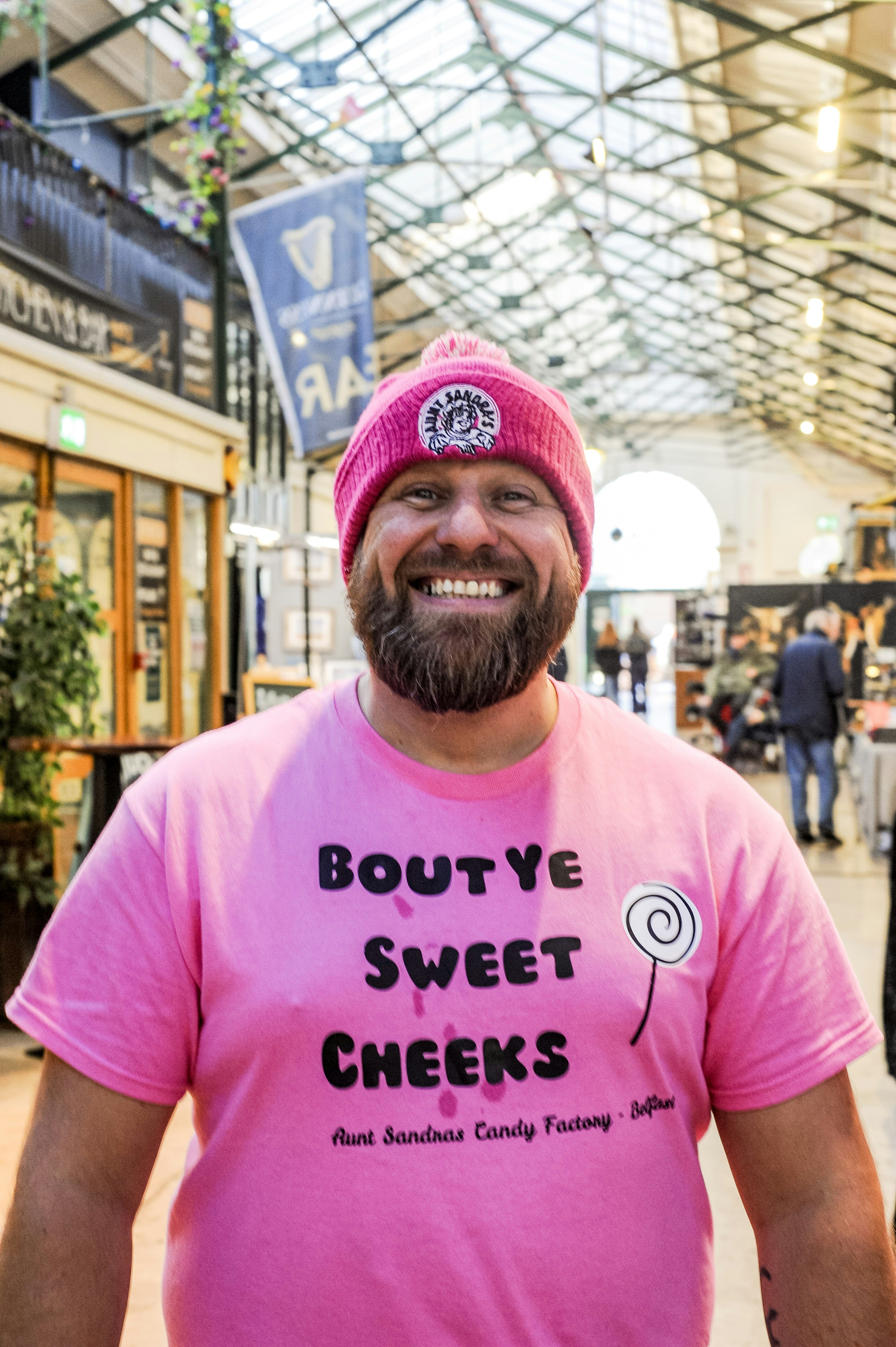 Smiling man in pink t-shirt - Free Photo on Unsplash