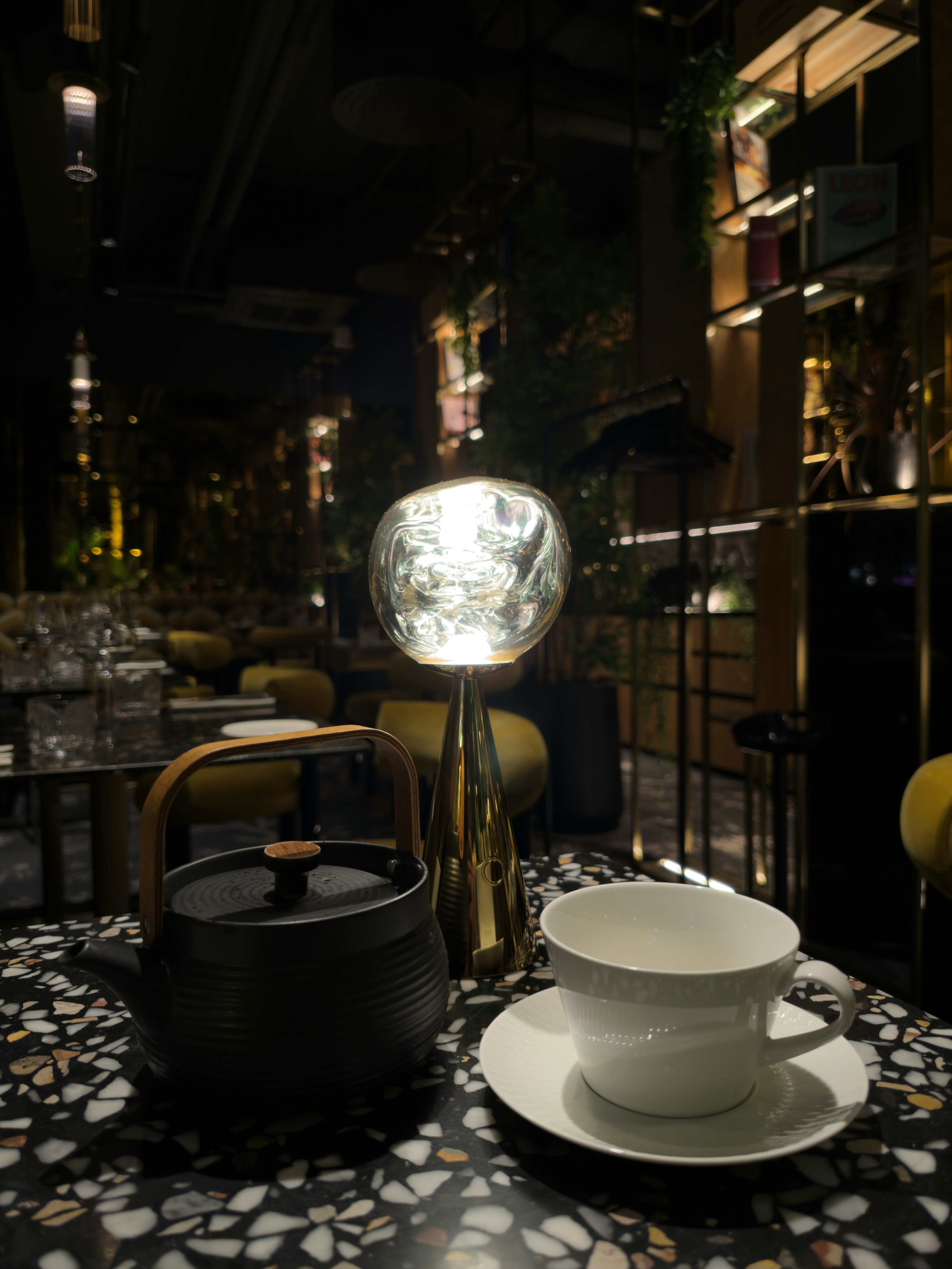 Teapot and teacup on terrazzo table - Free Photo on Unsplash
