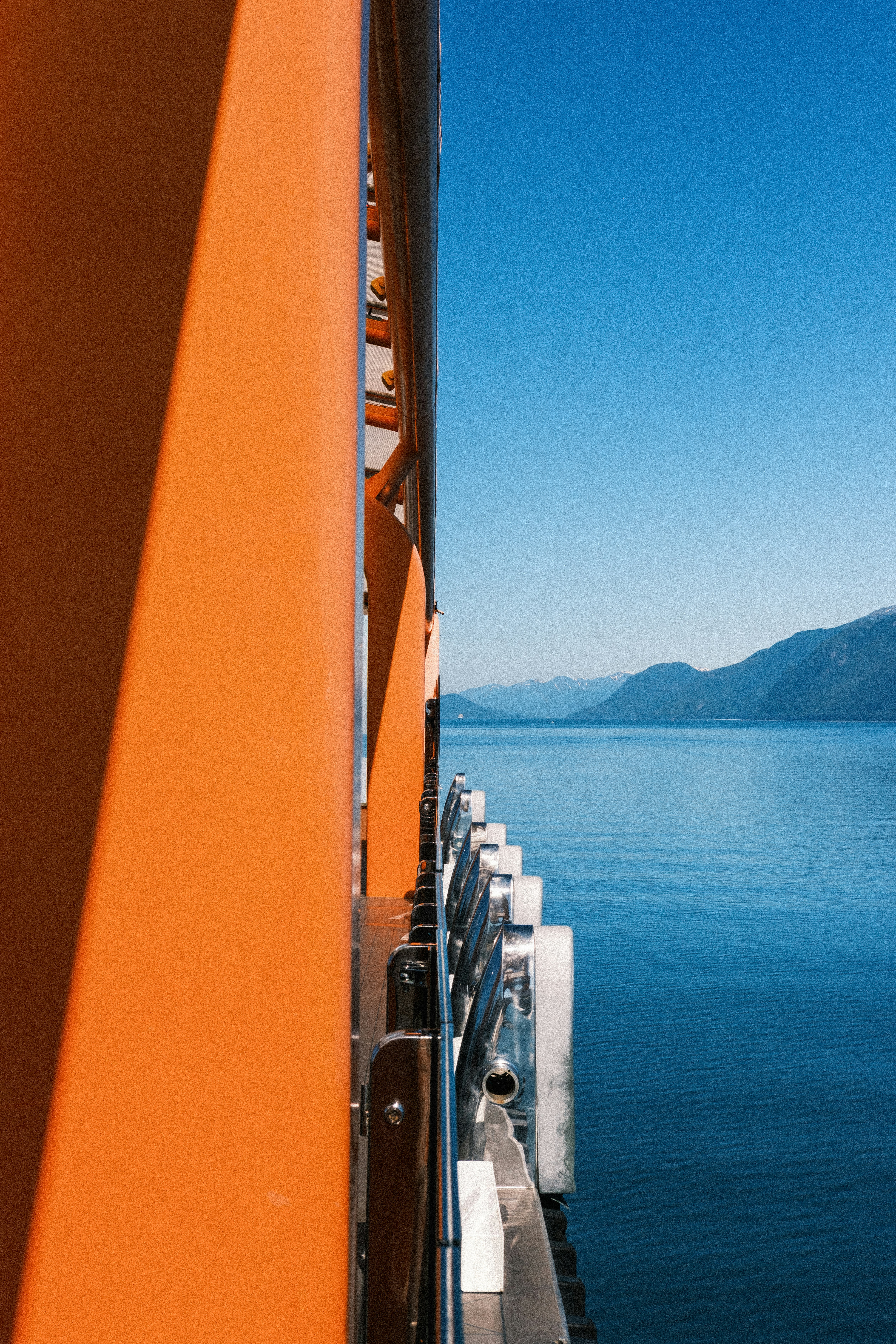 Ferry deck overlooking blue mountain water - Free Photo on Unsplash