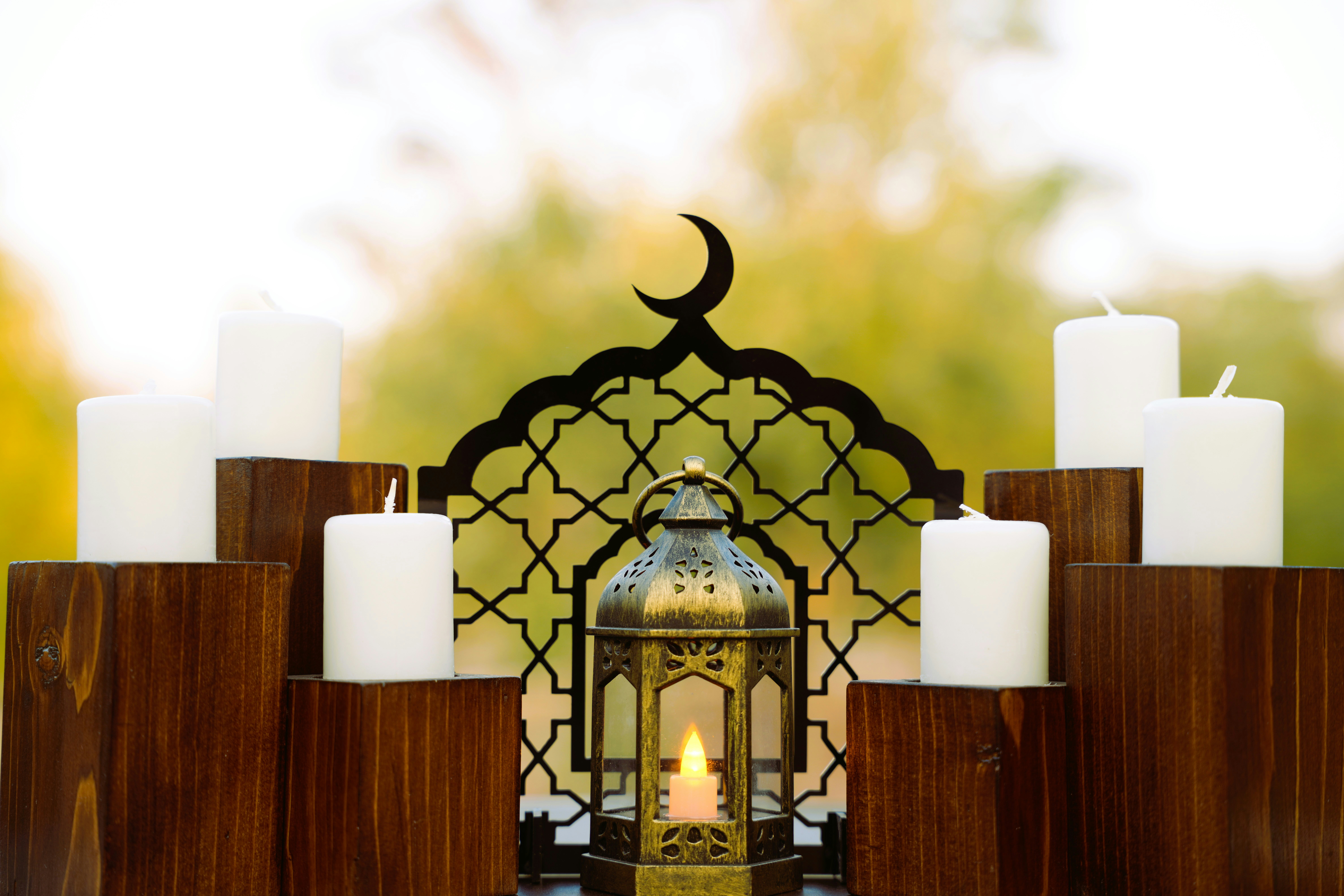 Lantern and candles with crescent arch - Free Photo on Unsplash