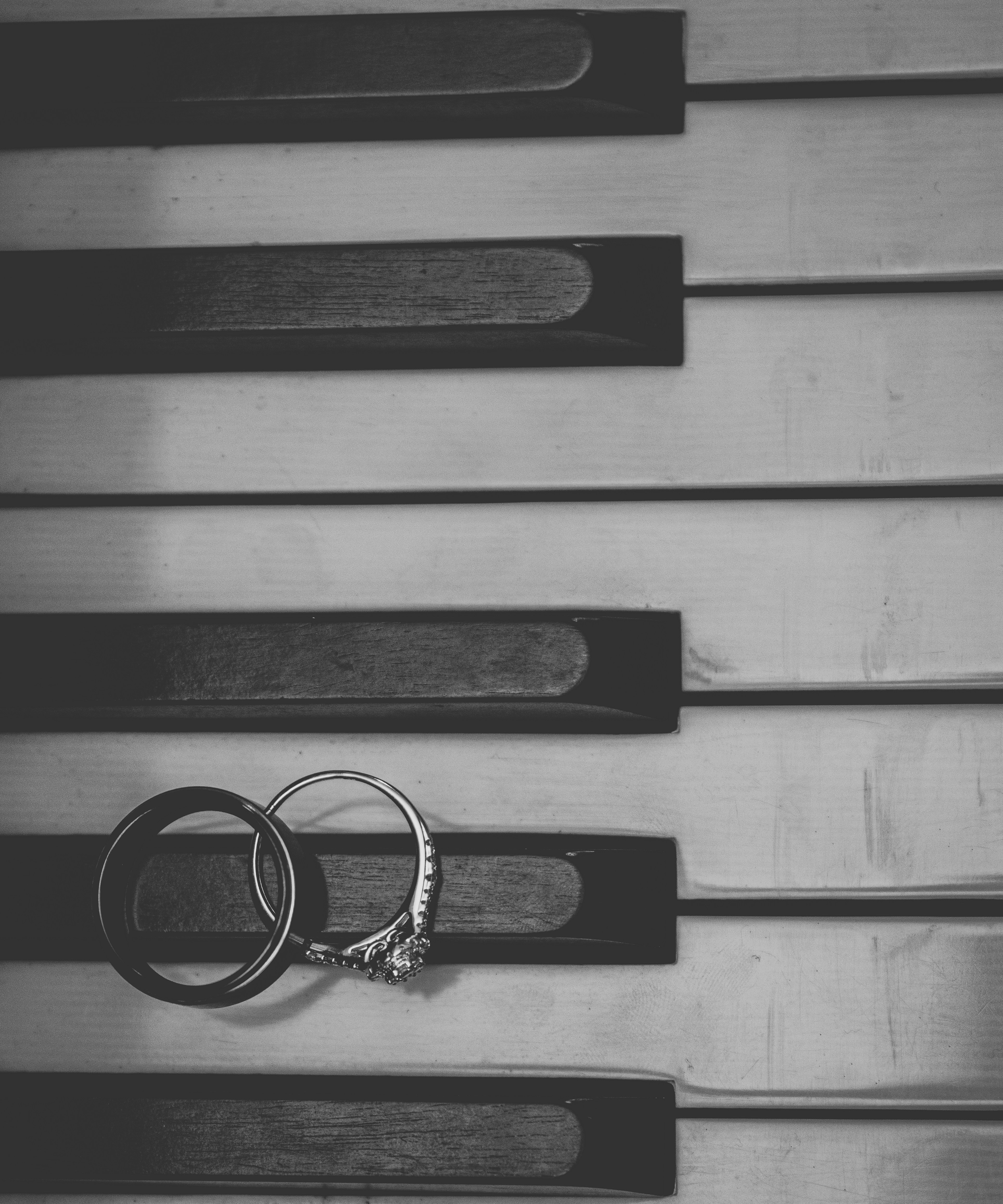 Wedding rings on piano keys - Free Photo on Unsplash