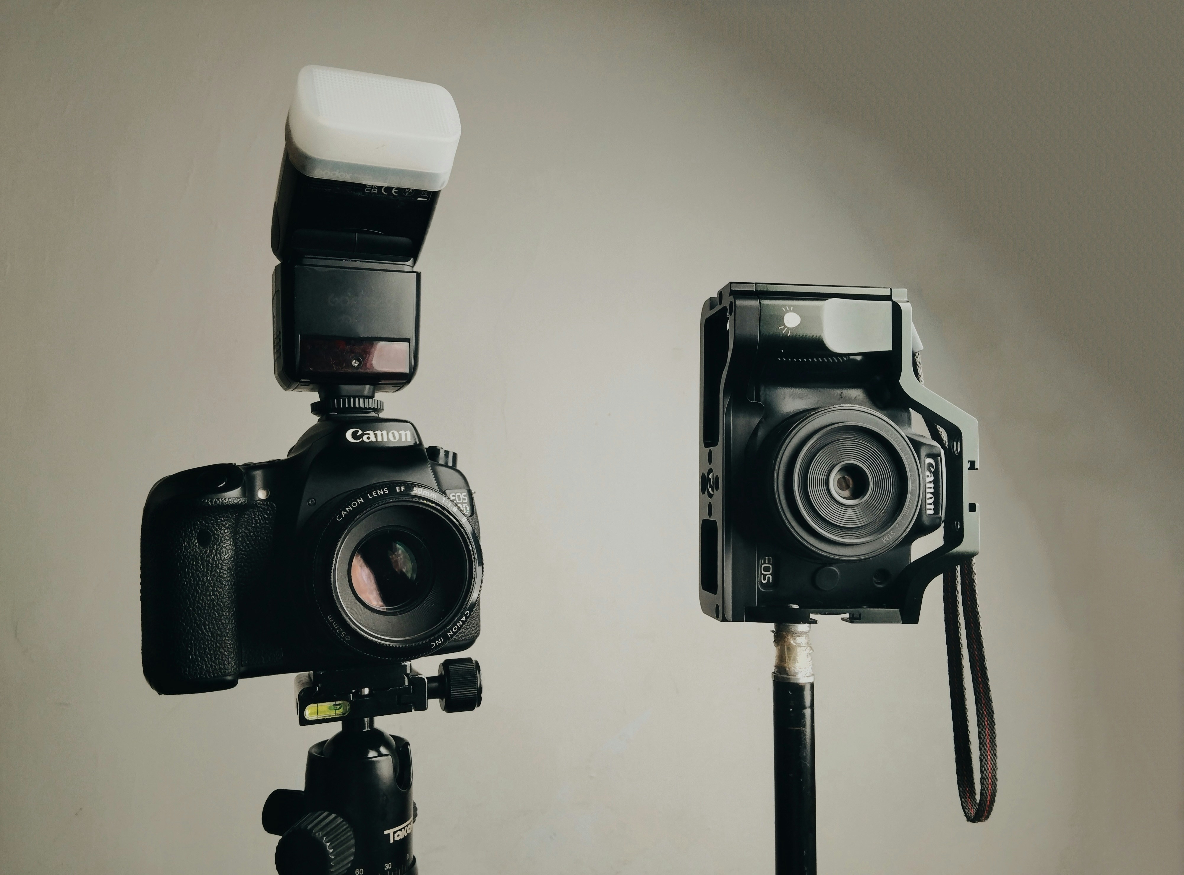 Two Canon cameras on tripods - Free Photo on Unsplash