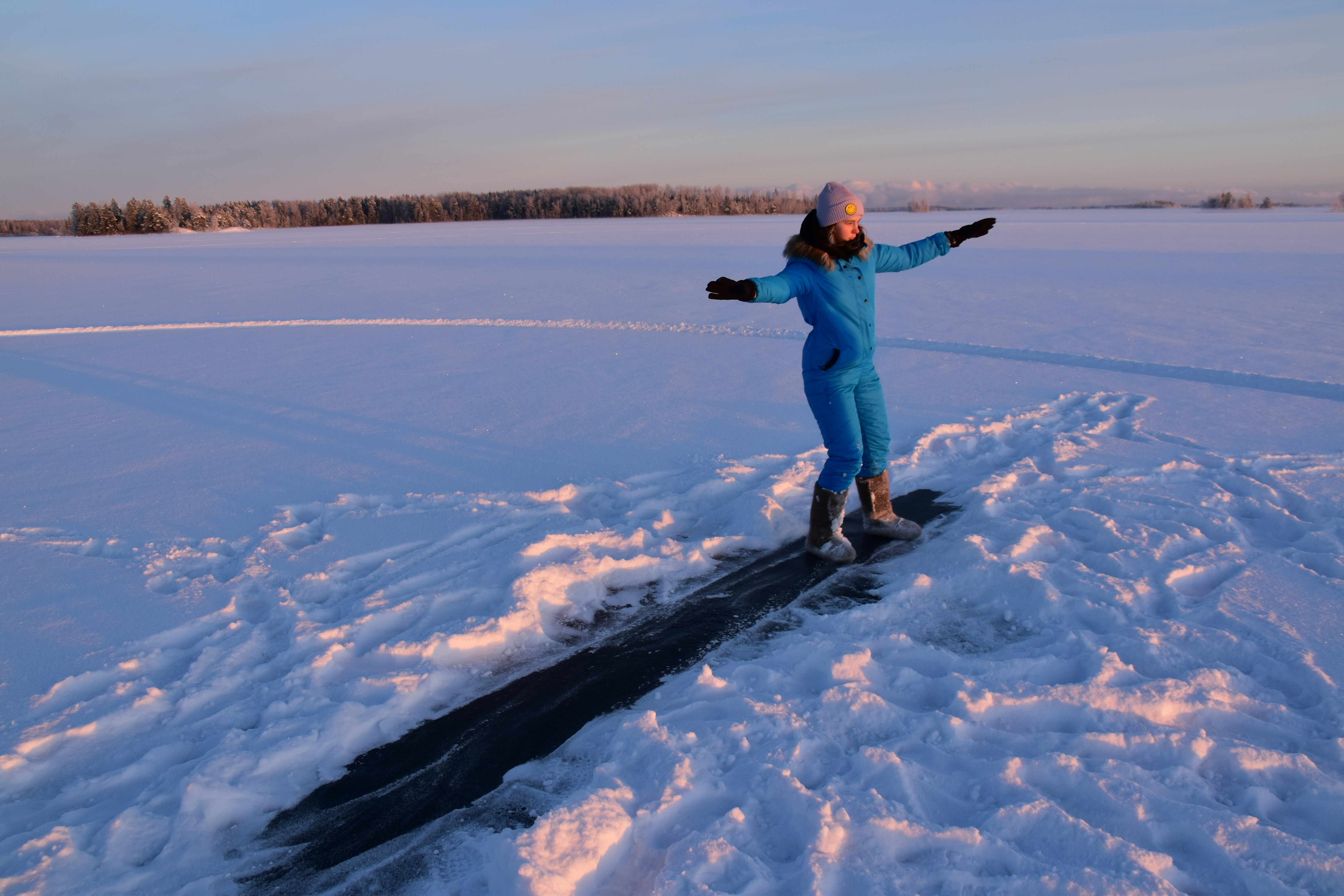 Person balancing on frozen lake ice - Free Photo on Unsplash