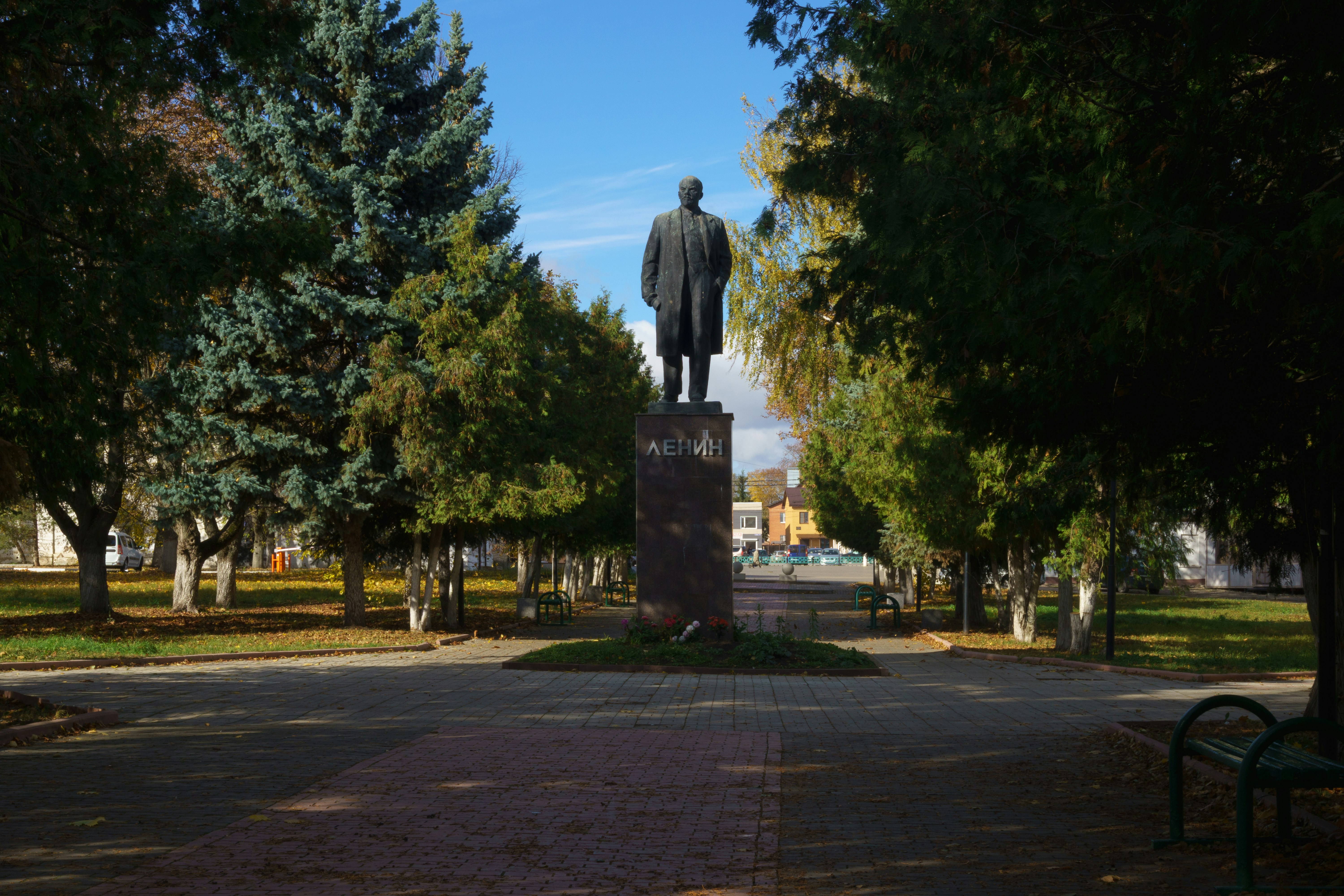 Lenin statue in park with trees - Free Photo on Unsplash