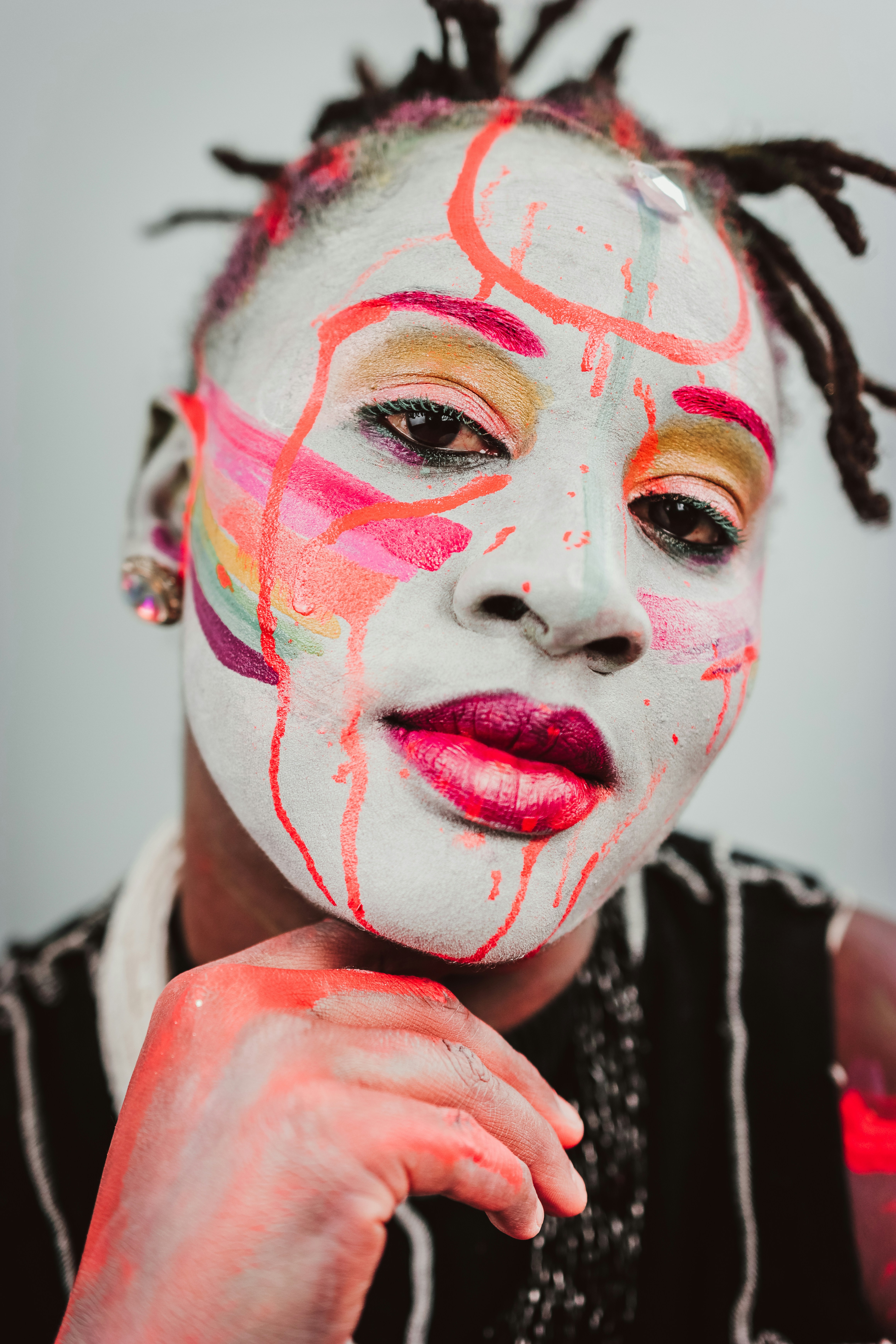 Person with painted face and hand - Free Photo on Unsplash