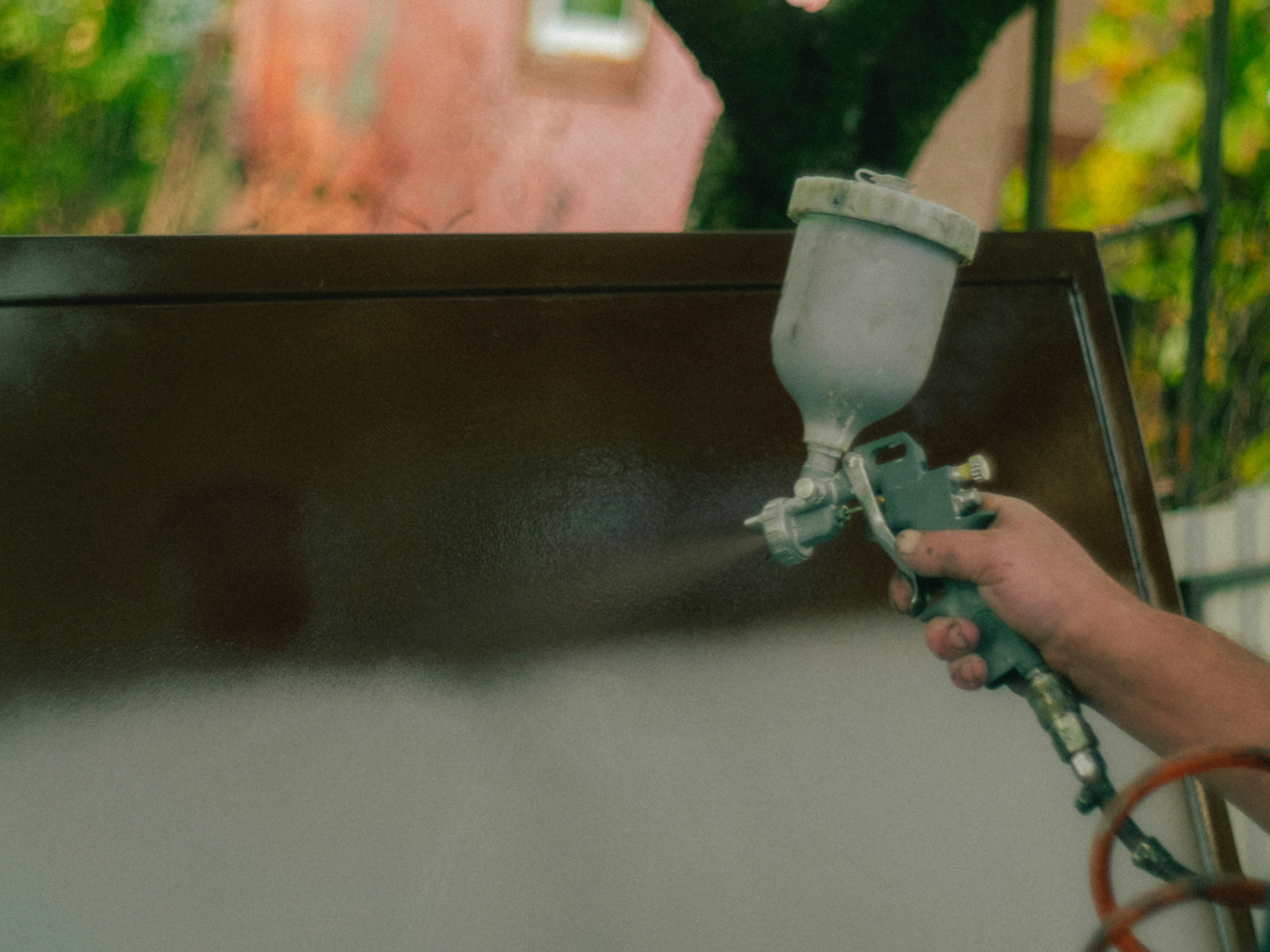 Hand painting metal with spray gun - Free Photo on Unsplash