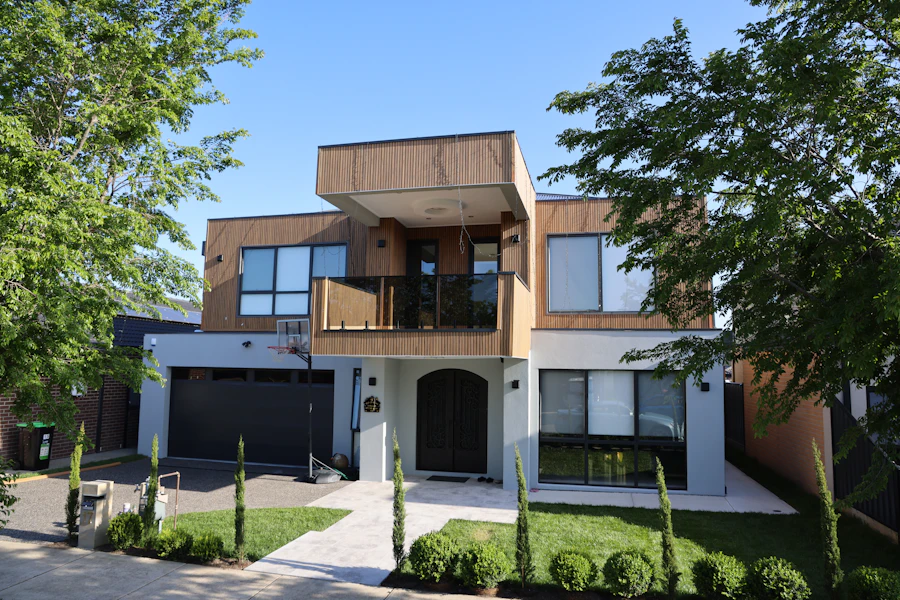Stock photo: modern two-story house with wood paneling and a balcony
