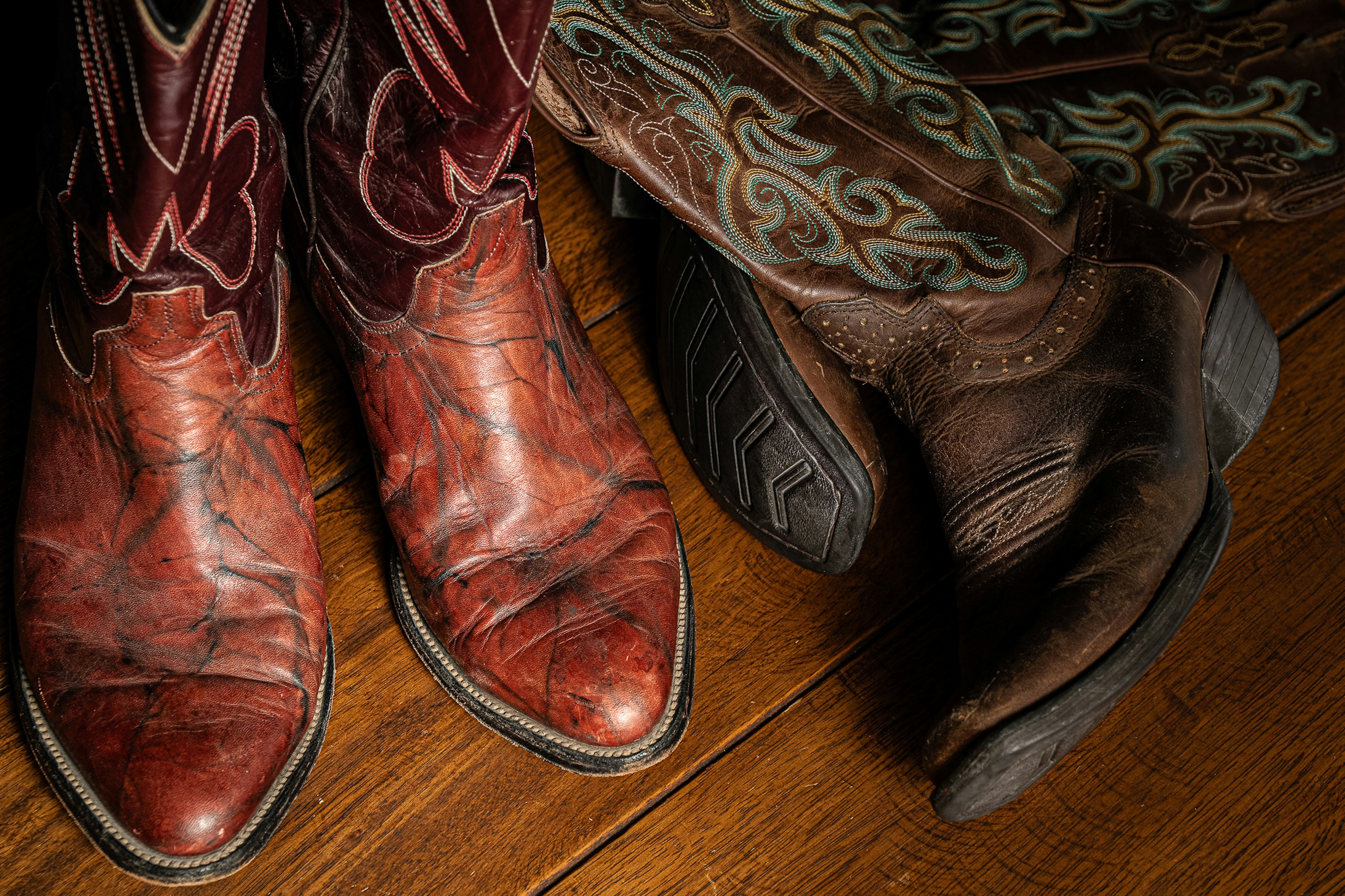 Worn leather cowboy boots on floor - Free Photo on Unsplash