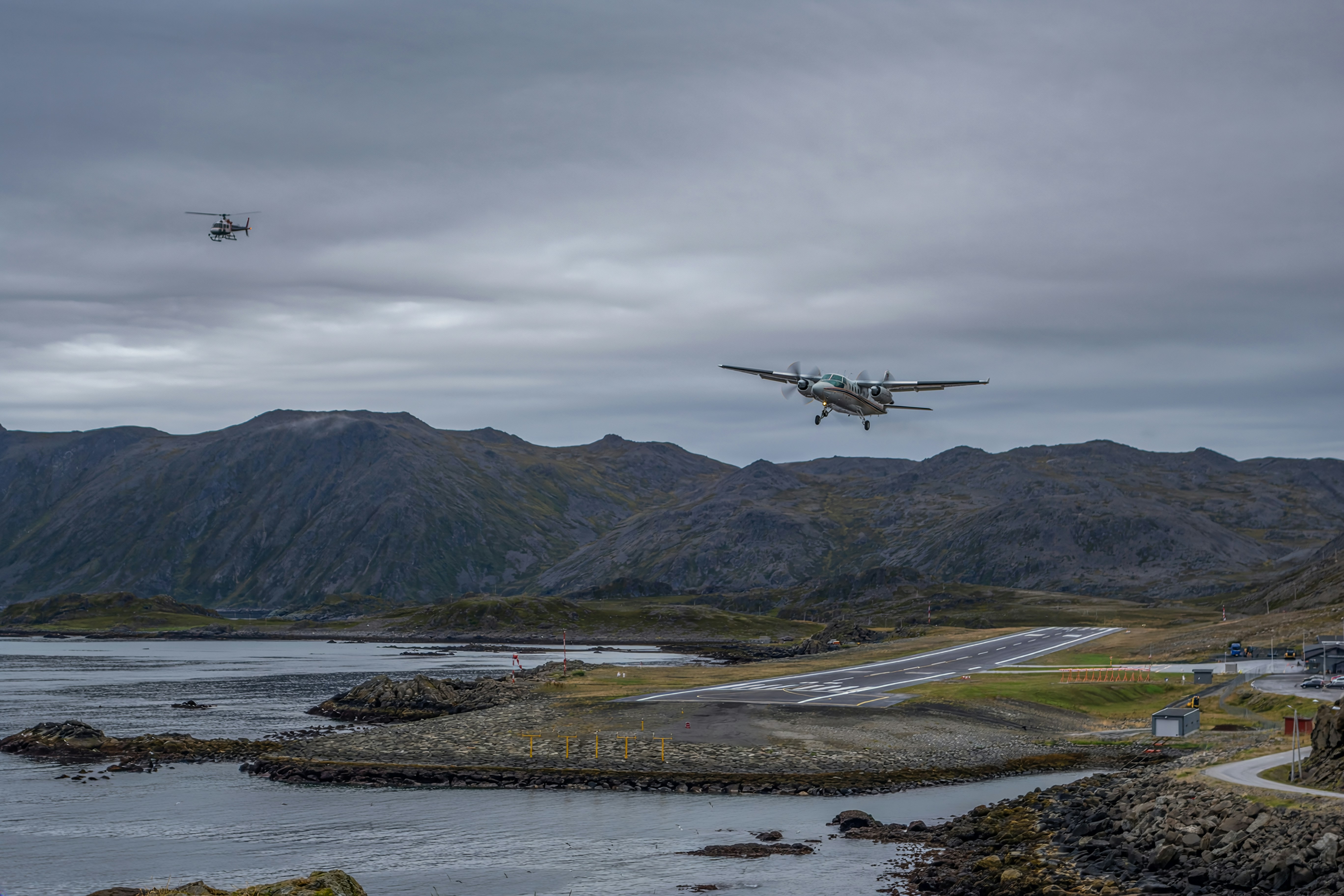Airplane landing on coastal runway - Free Photo on Unsplash